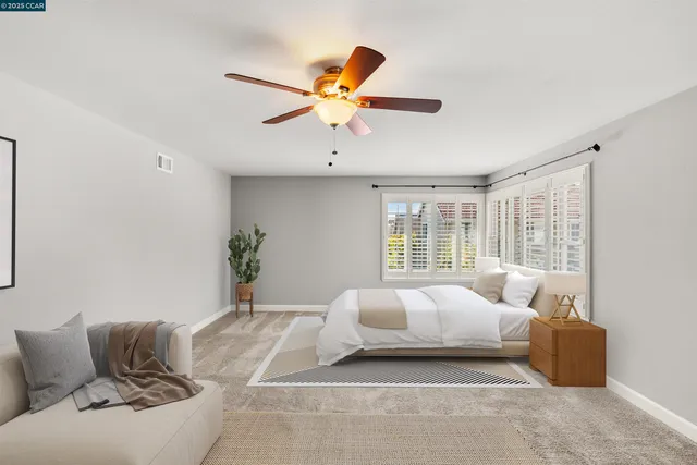 a view of empty room with a fireplace