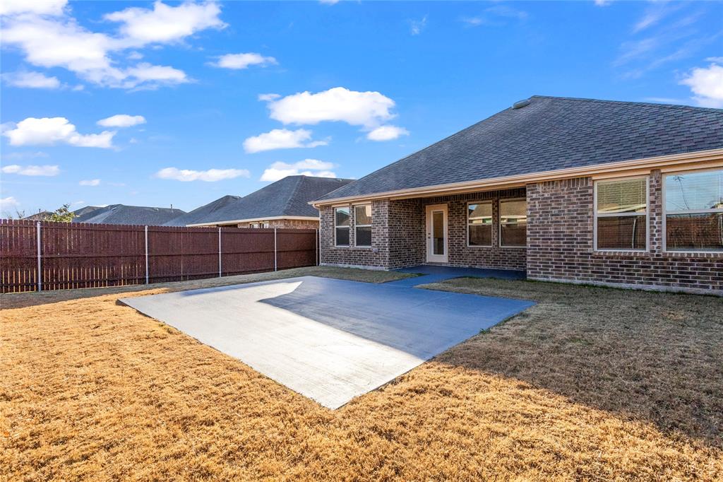 812 Indigo Road Princeton, TX 75407 - Photo 23 of 25 a house view with a backyard space