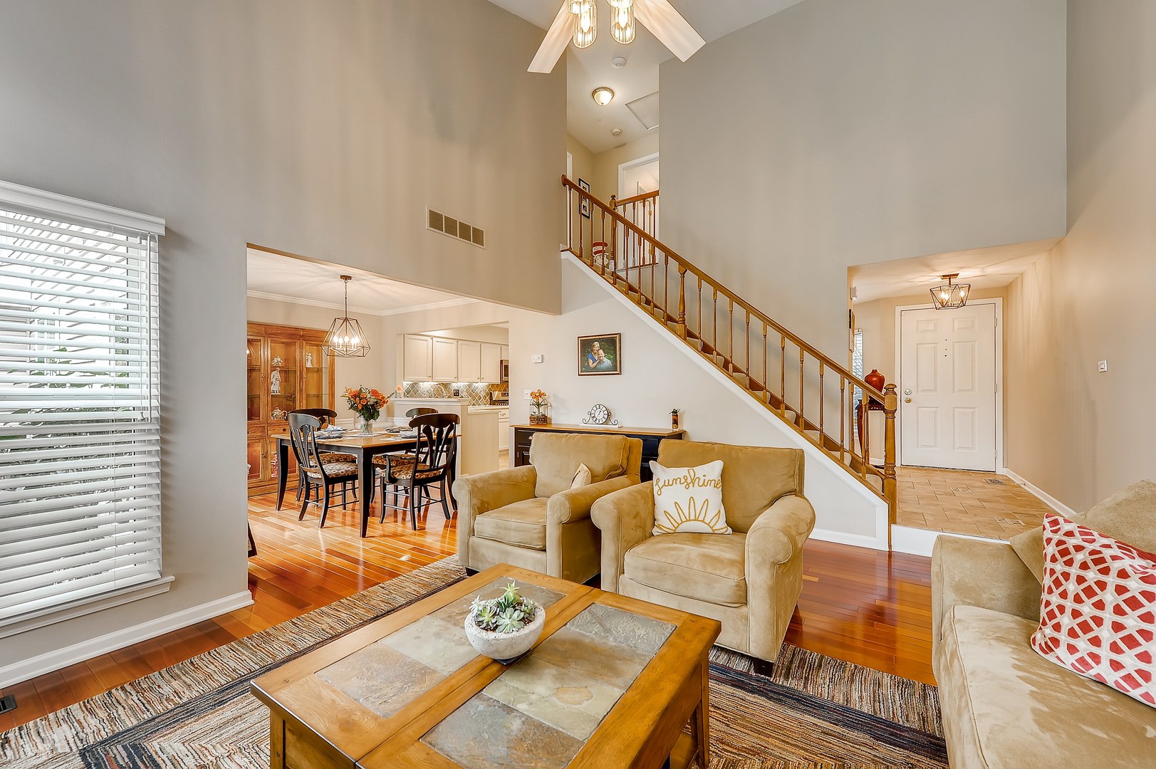 1043 Ridgefield Circle Carol Stream, IL 60188 - Photo 14 of 40 a living room with furniture and a dining table