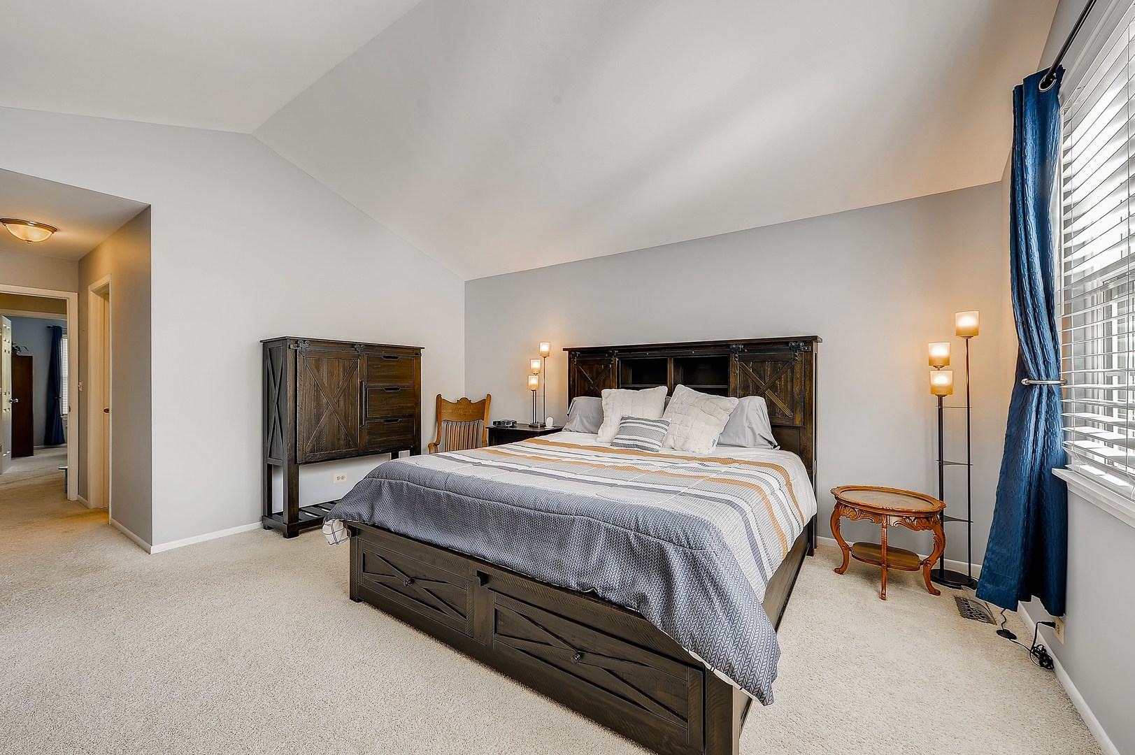 1043 Ridgefield Circle Carol Stream, IL 60188 - Photo 18 of 40 a bedroom with a bed and wooden floor