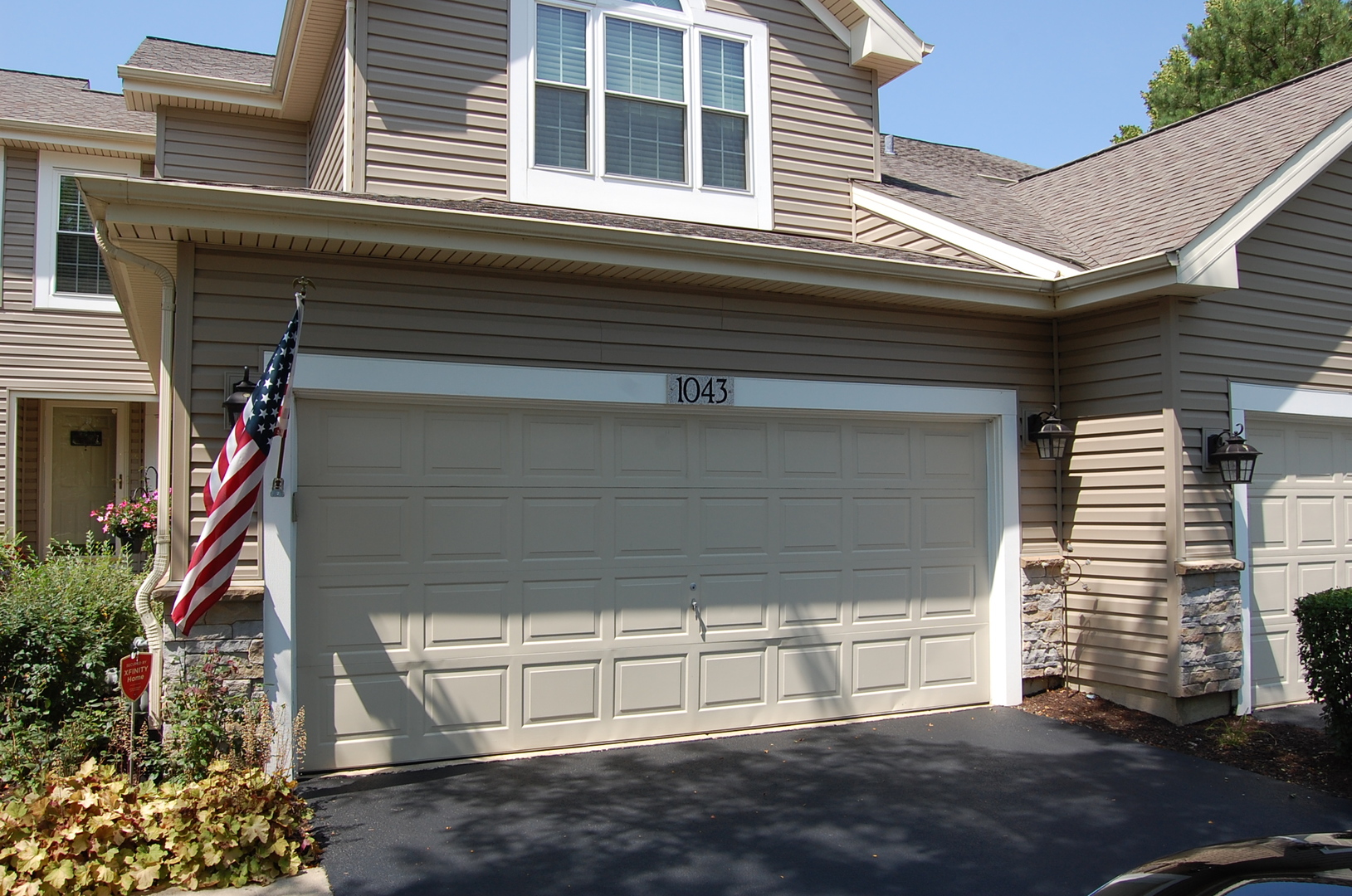 1043 Ridgefield Circle Carol Stream, IL 60188 - Photo 2 of 40 a view of a house with a yard