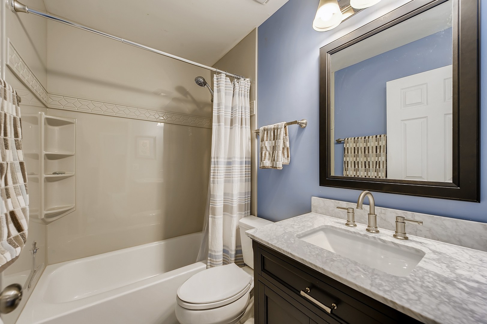 1043 Ridgefield Circle Carol Stream, IL 60188 - Photo 21 of 40 a bathroom with a granite countertop sink toilet and shower