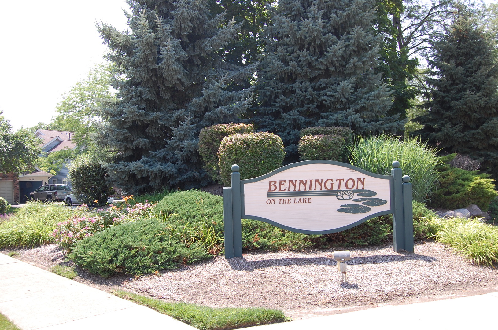 1043 Ridgefield Circle Carol Stream, IL 60188 - Photo 40 of 40 a sign that is sitting on a brick wall