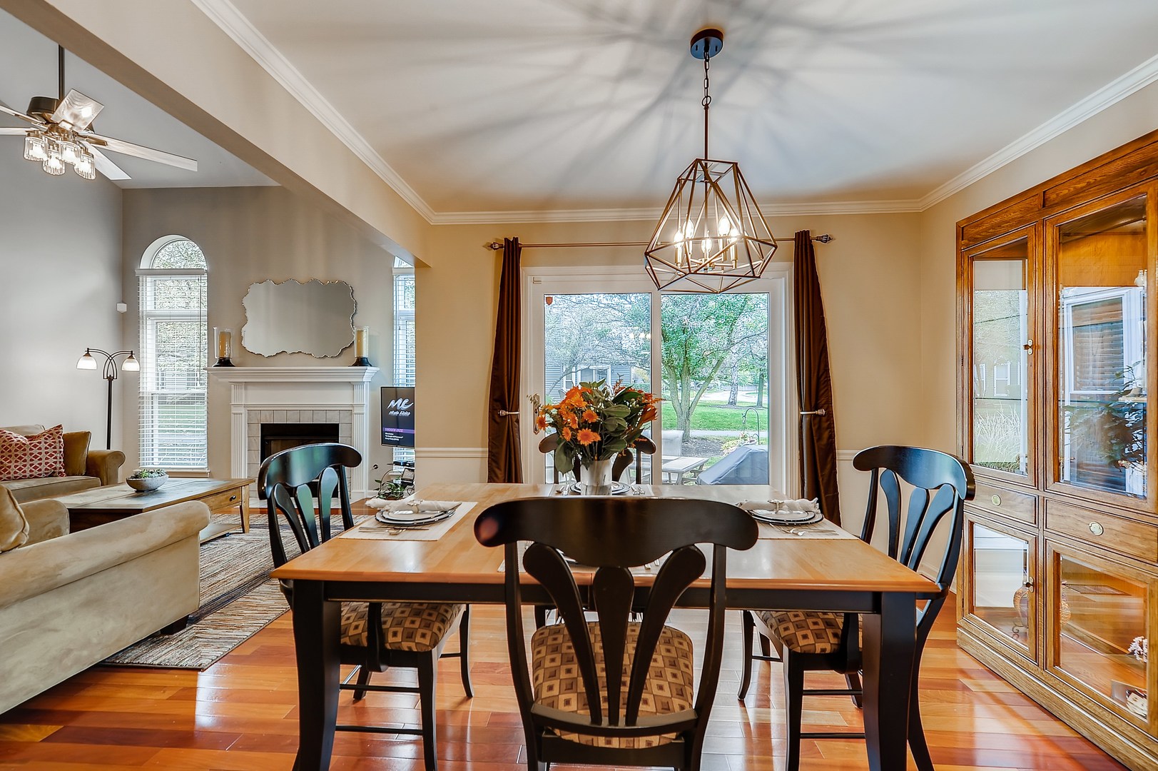 1043 Ridgefield Circle Carol Stream, IL 60188 - Photo 6 of 40 a view of a dining room with furniture window and outside view