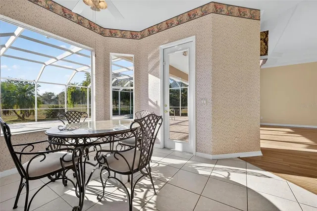 a patio with table and chairs