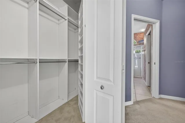 a view of an empty walk in closet