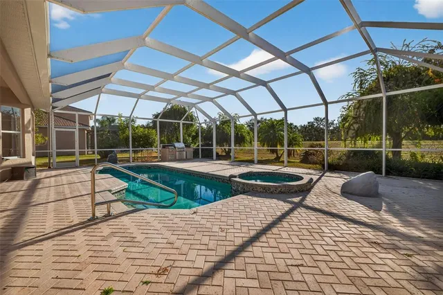a view of a swimming pool with a porch
