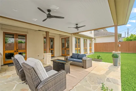 a living room with furniture and a yard