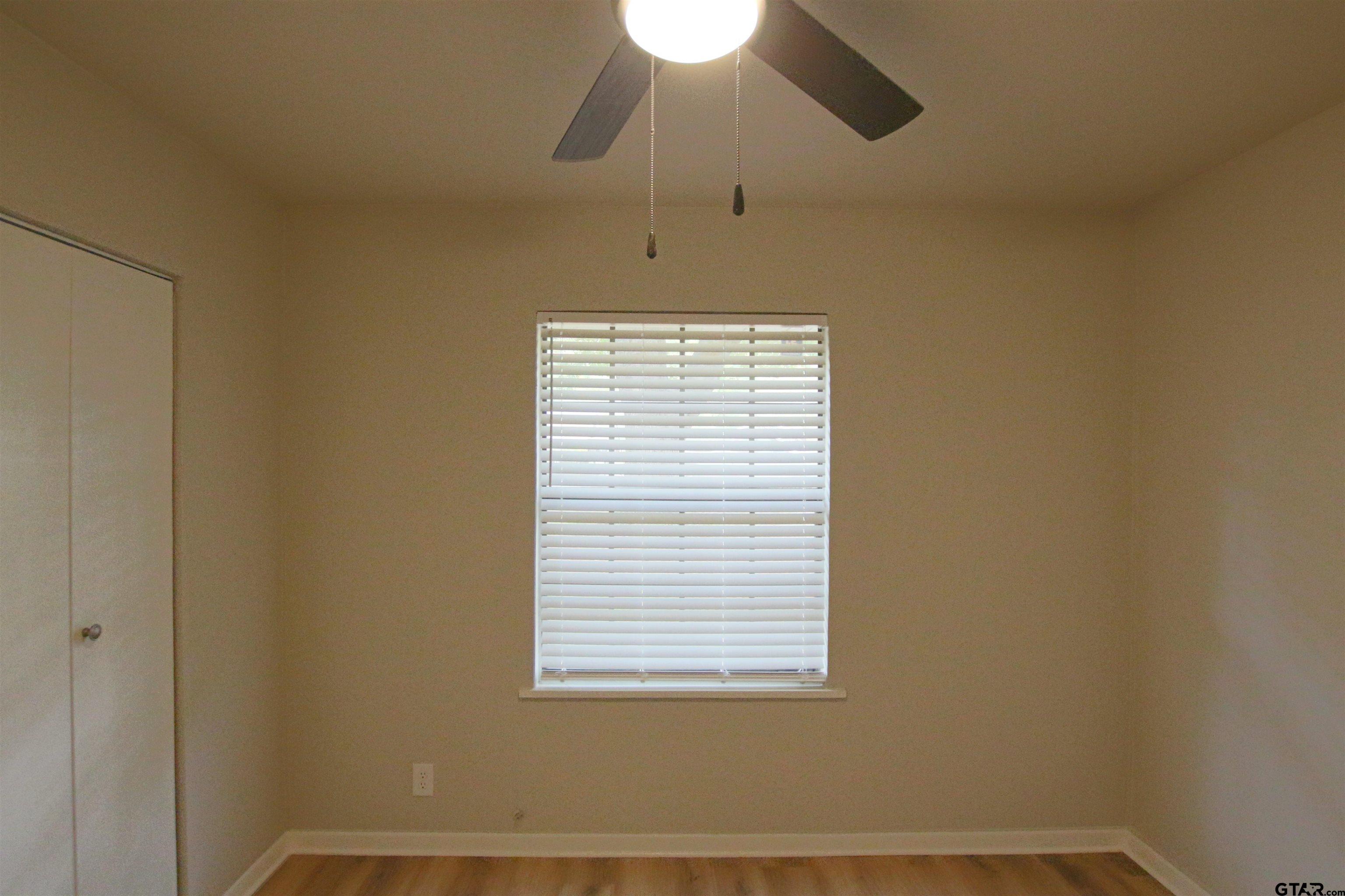 12336 Chapman Road Tyler, TX 75708 - Photo 15 of 19 a view of an empty room with a window