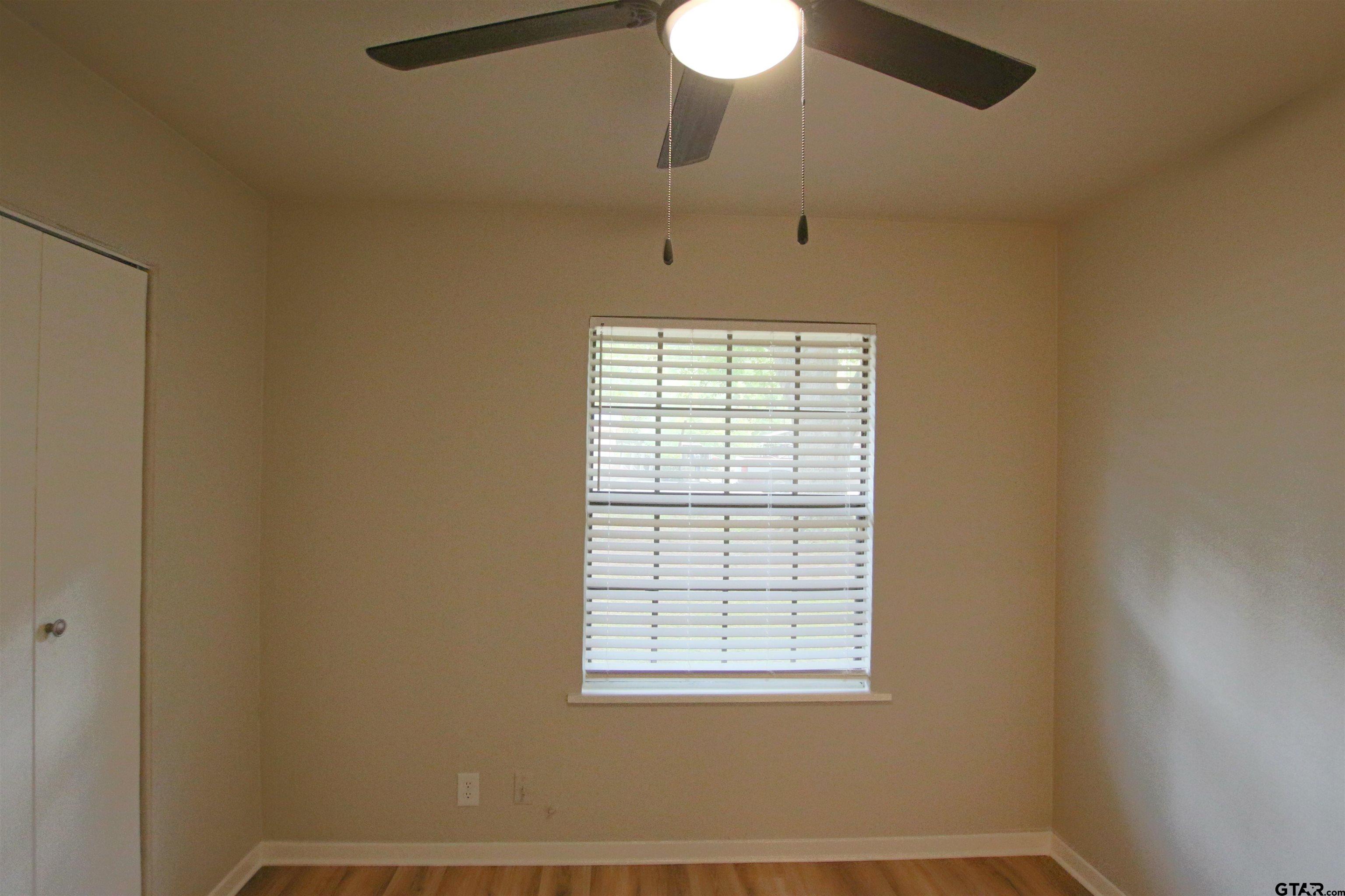 12336 Chapman Road Tyler, TX 75708 - Photo 9 of 19 a view of an empty room with a window