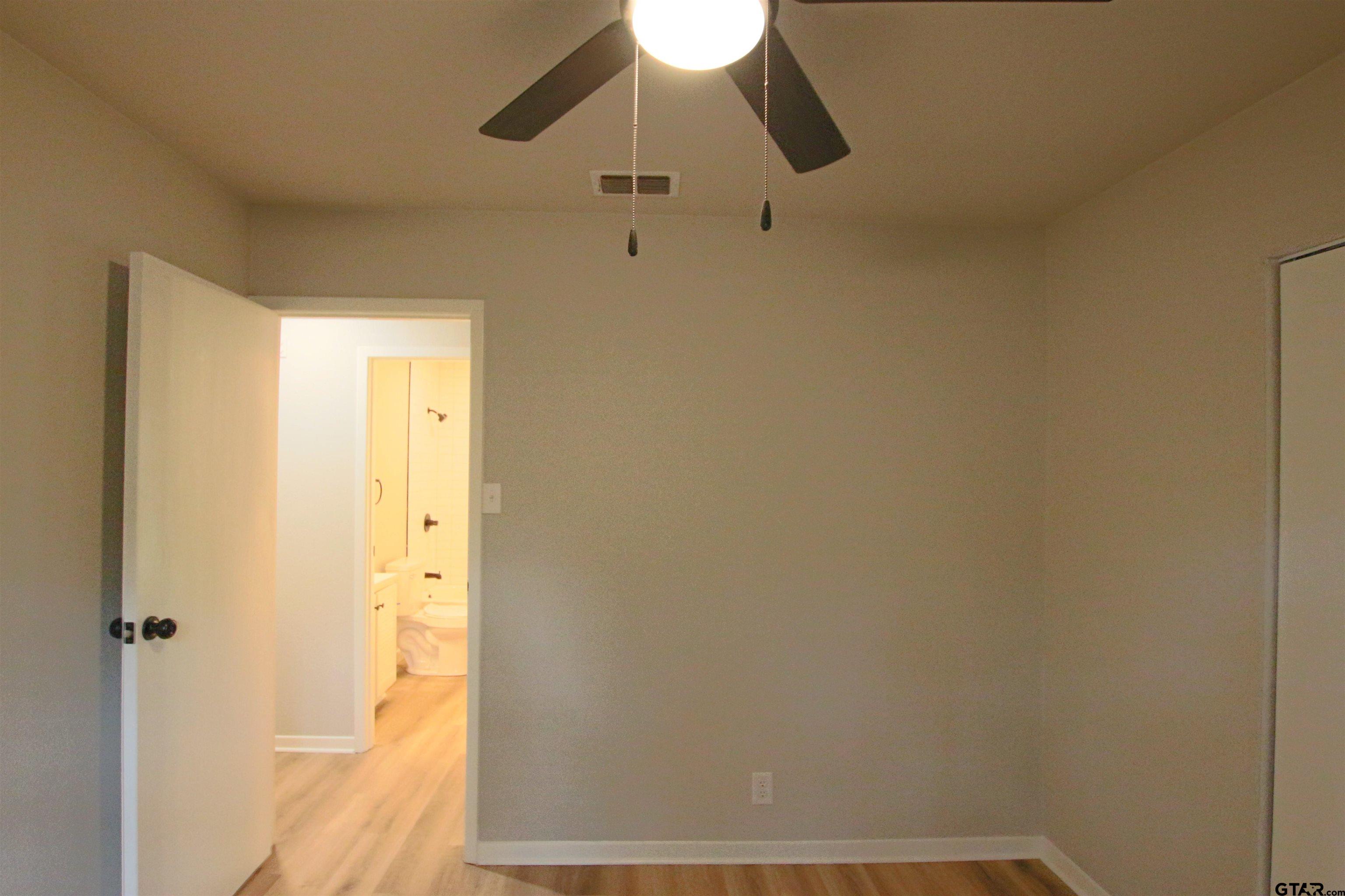 12336 Chapman Road Tyler, TX 75708 - Photo 10 of 19 a bathroom with a shower