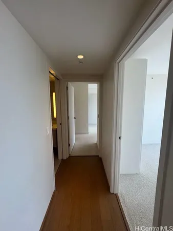 a view of hallway with a window and a hallway