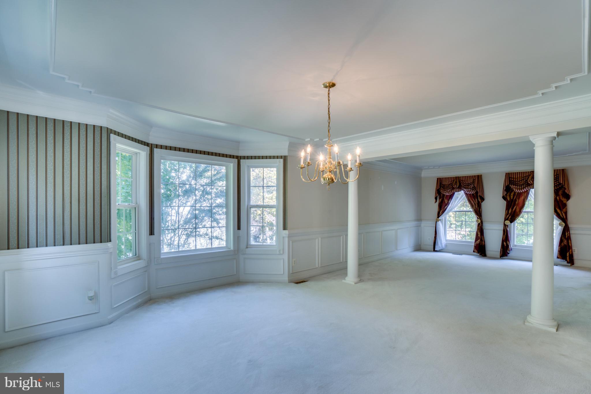218 Greenbank Road Fredericksburg, VA 22406 - Photo 12 of 20 a view of a chandelier and a fireplace in a room