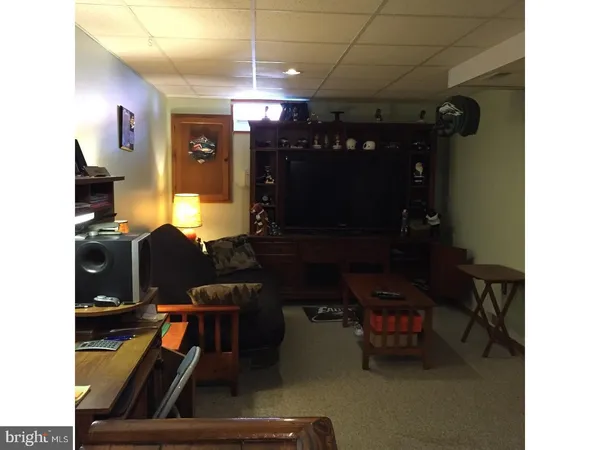 a view of a workspace with furniture