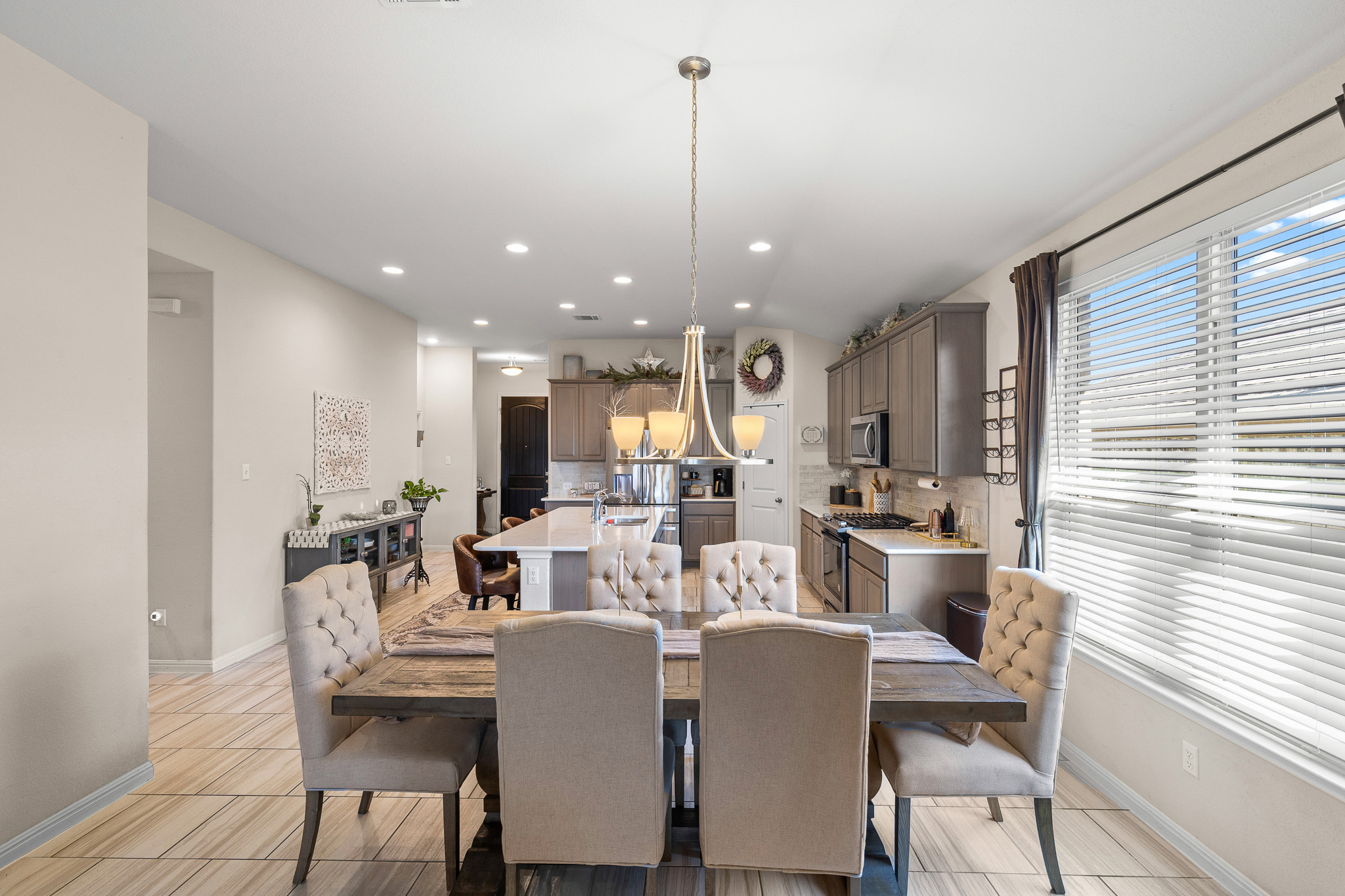 276 Finstown Street Hutto, TX 78634 - Photo 5 of 19 a view of a dining room with furniture window and outside view