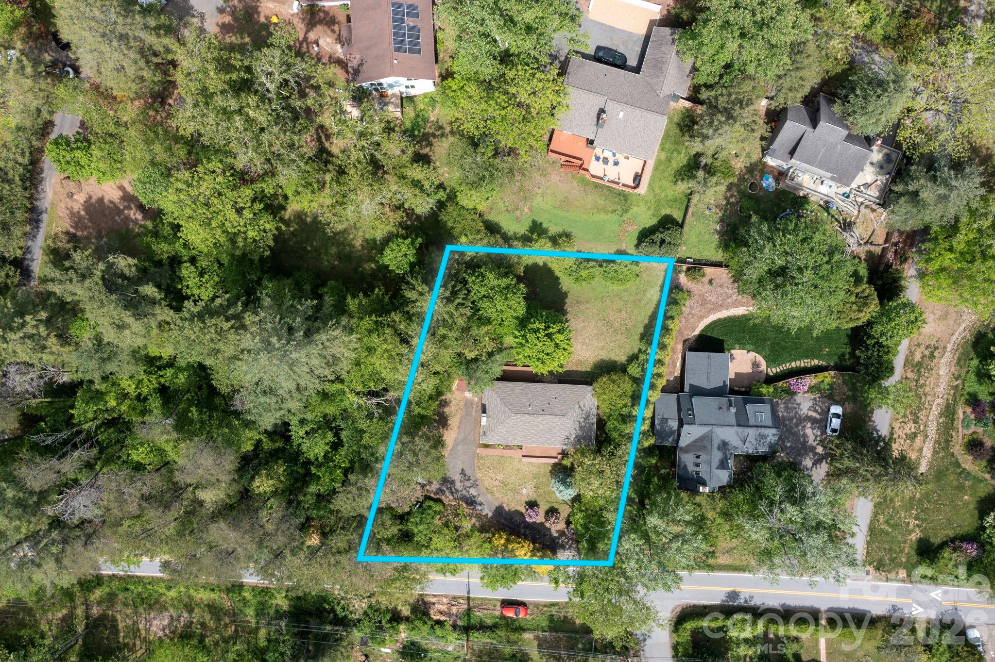 34 Wolfe Cove Road Asheville, NC 28804 - Photo 41 of 42 an aerial view of a house with a yard