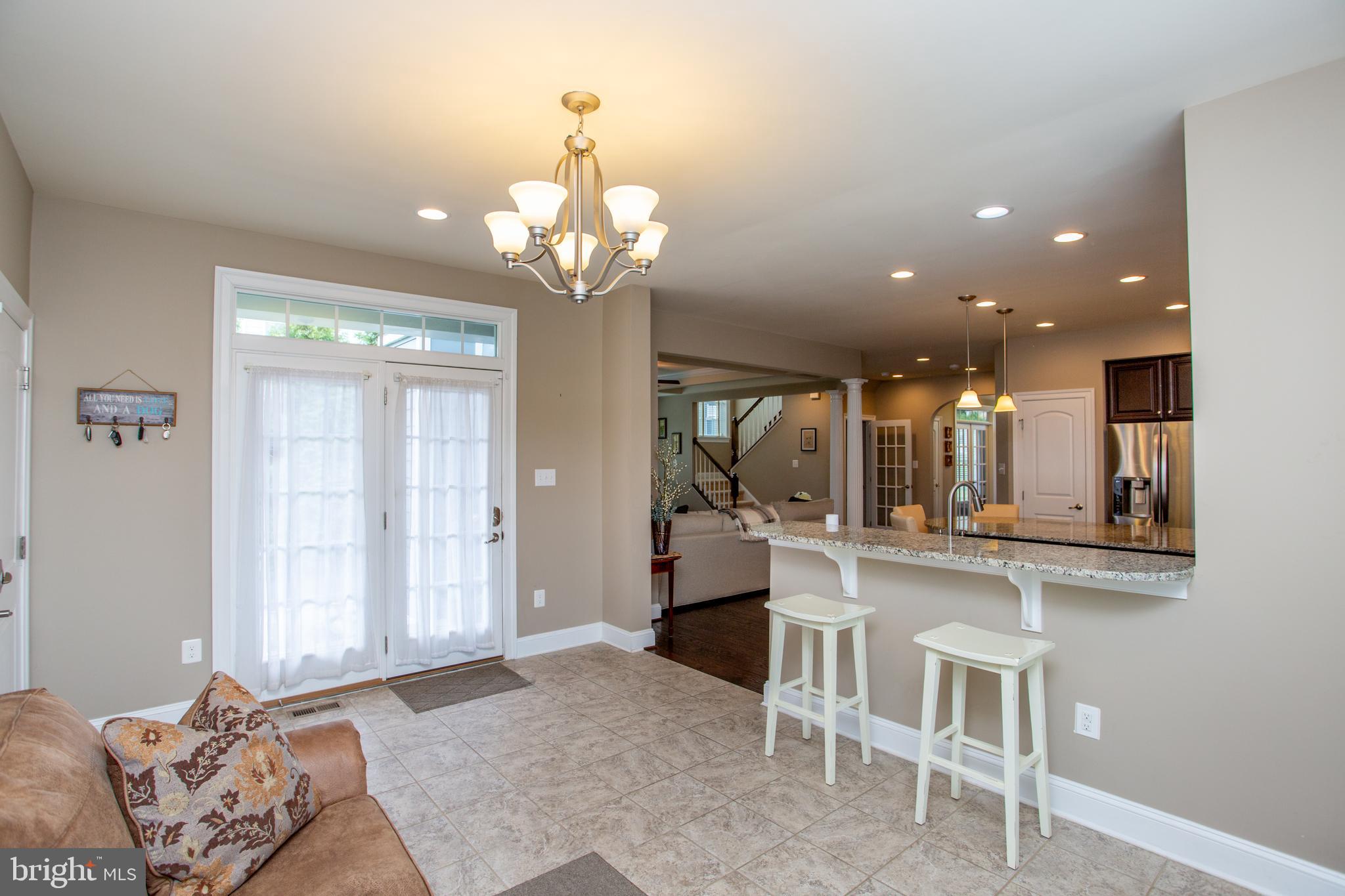4682 Plough Tavern Road Doylestown, PA 18902 - Photo 17 of 42 a large kitchen with a table and chairs