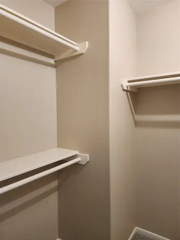 a view of a hallway with an empty space