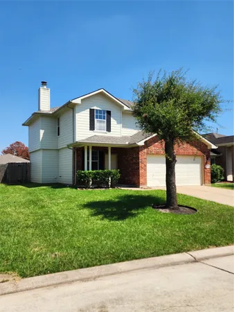 a view of a house with a park