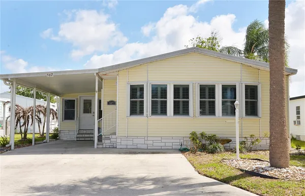 $235,000 | 567 Dolphin Circle, Barefoot Bay, FL 32976