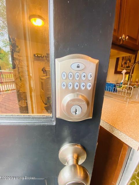 7410 Lark Road Crestwood, KY 40014 - Photo 13 of 29 Front and back doors have keypad entry locks.