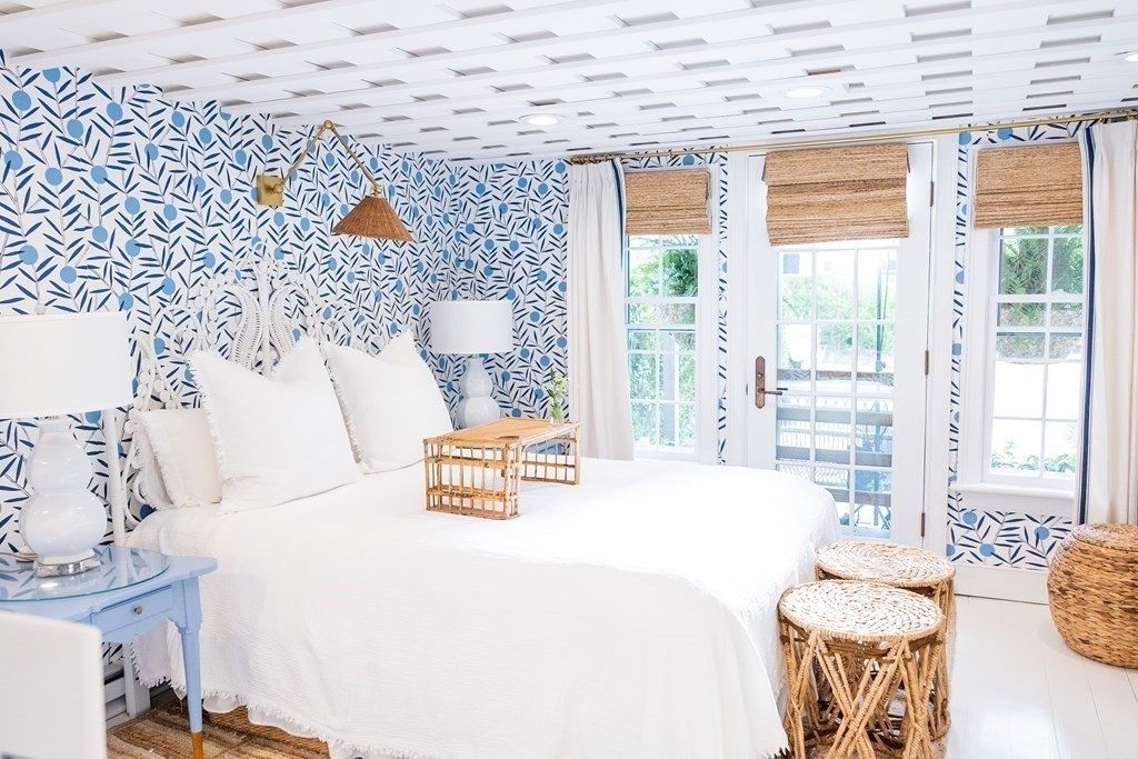 7 Bank Street Nantucket, MA 02554 - Photo 15 of 34 a bedroom with a bed and a table