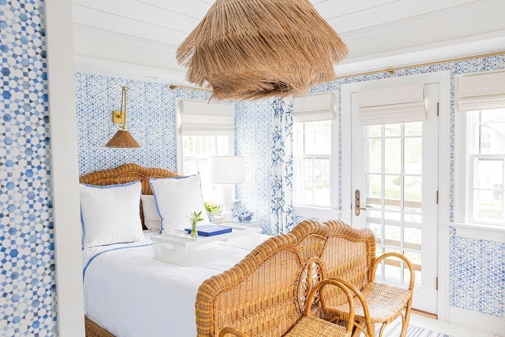 7 Bank Street Nantucket, MA 02554 - Photo 20 of 34 a bedroom with a bed and a painting on the wall