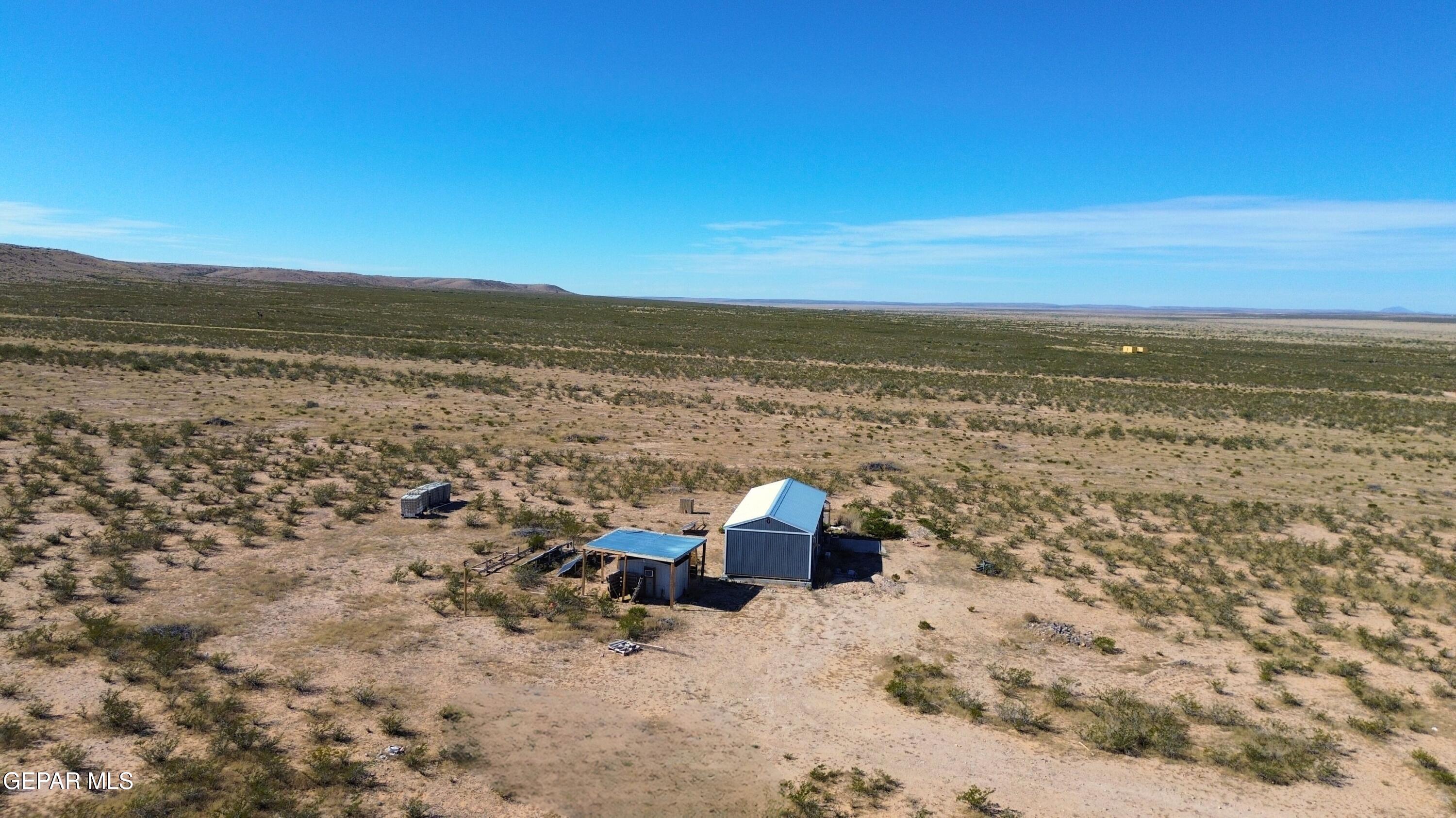 26 Ponderosa Road Salt Flat, TX 79847 - Photo 11 of 56 a view of a sky from a yard