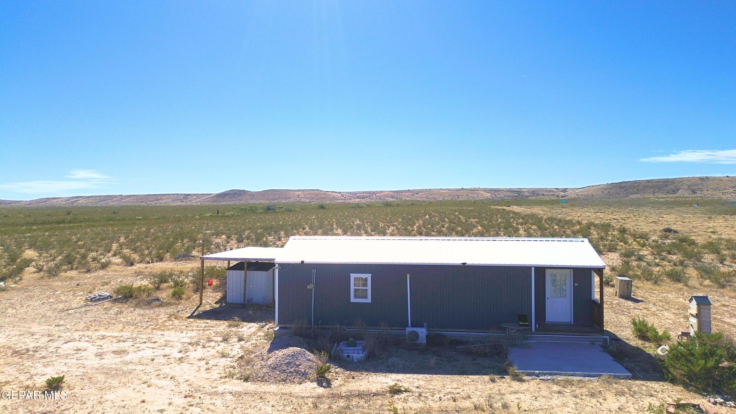 26 Ponderosa Road Salt Flat, TX 79847 - Photo 13 of 56 a view of a terrace with skyline