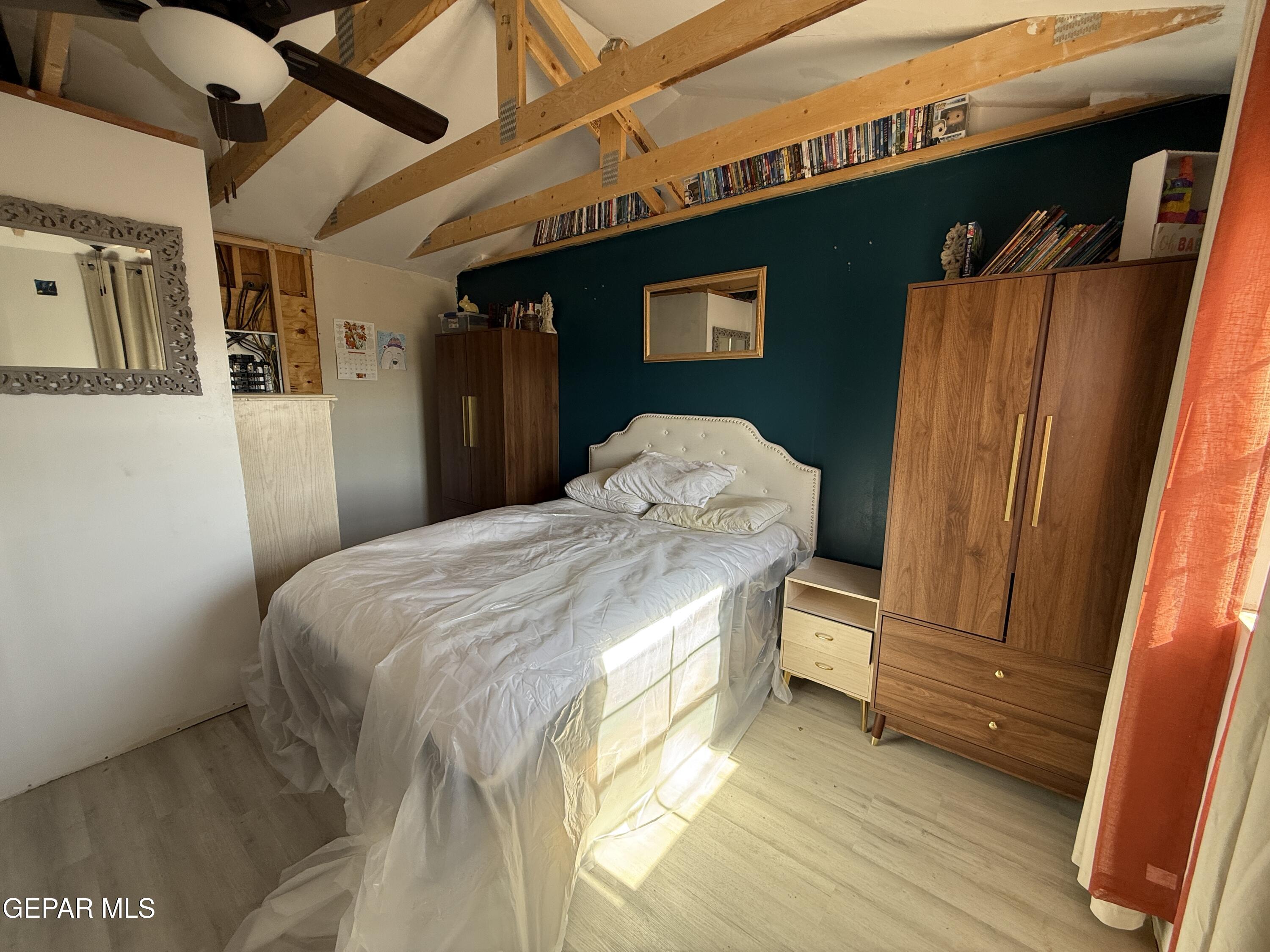 26 Ponderosa Road Salt Flat, TX 79847 - Photo 19 of 56 a bedroom with a bed and a mirror