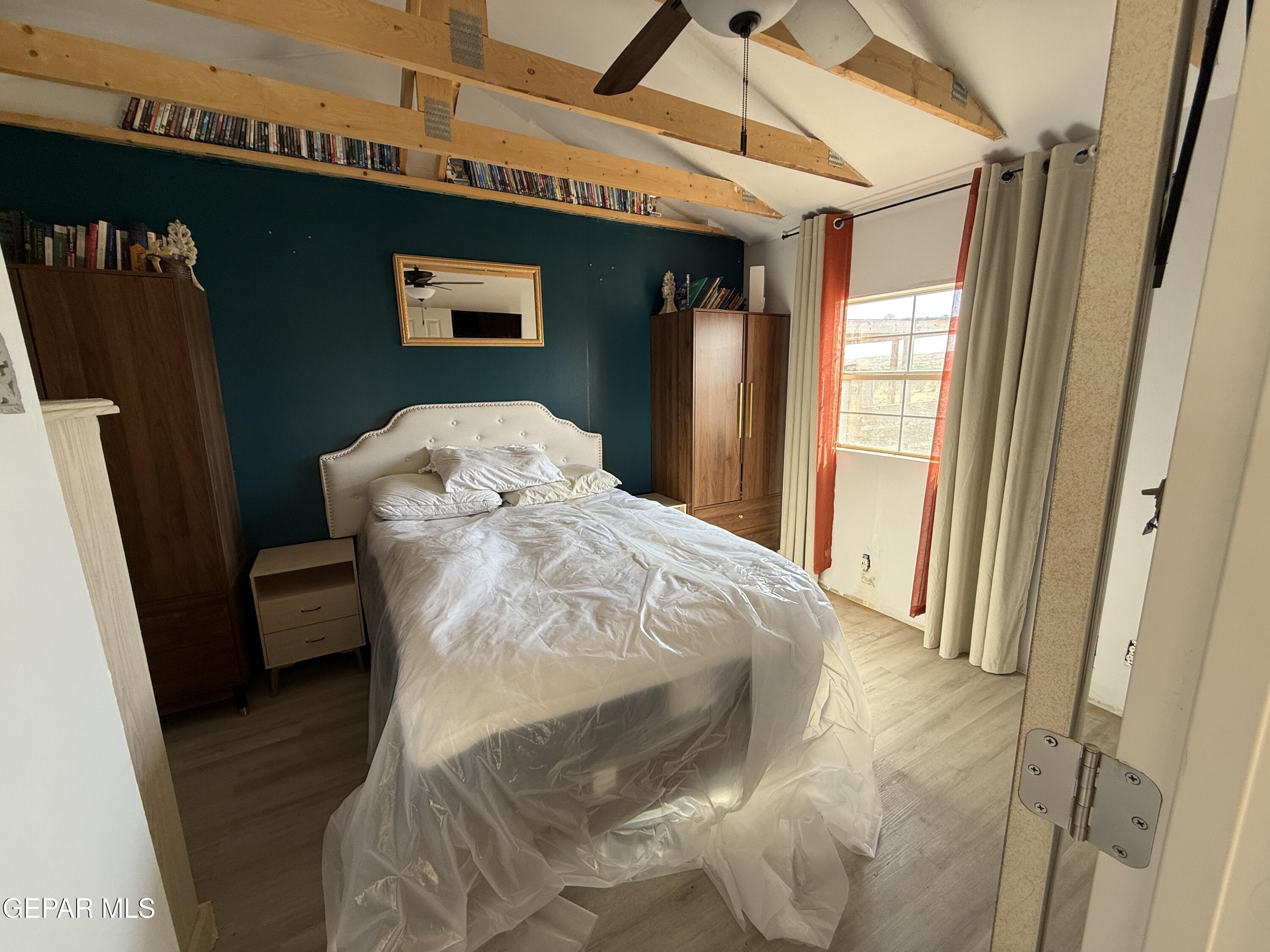 26 Ponderosa Road Salt Flat, TX 79847 - Photo 20 of 56 a bedroom with a bed and a mirror