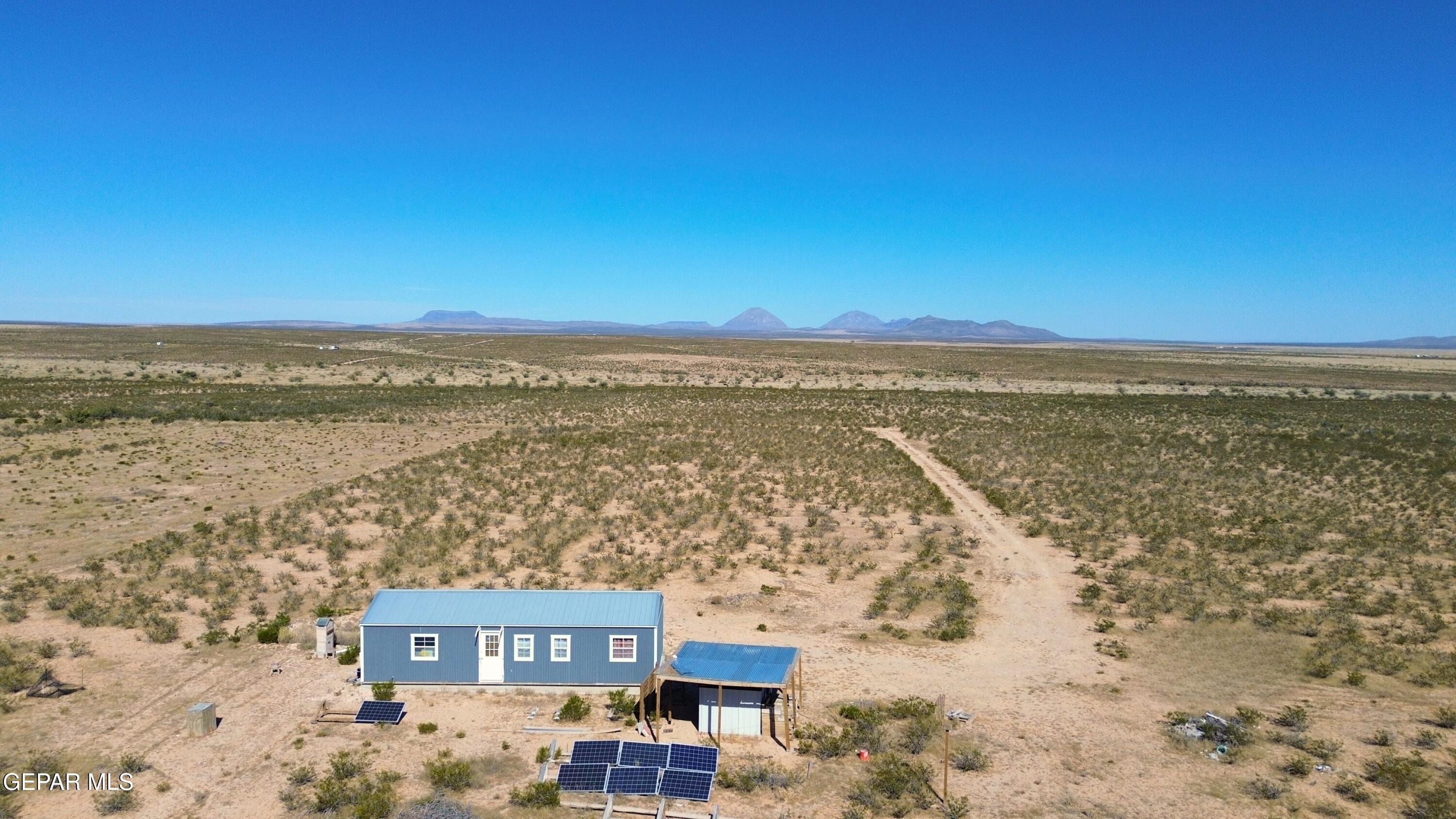 26 Ponderosa Road Salt Flat, TX 79847 - Photo 2 of 56 a view of a city with ocean view
