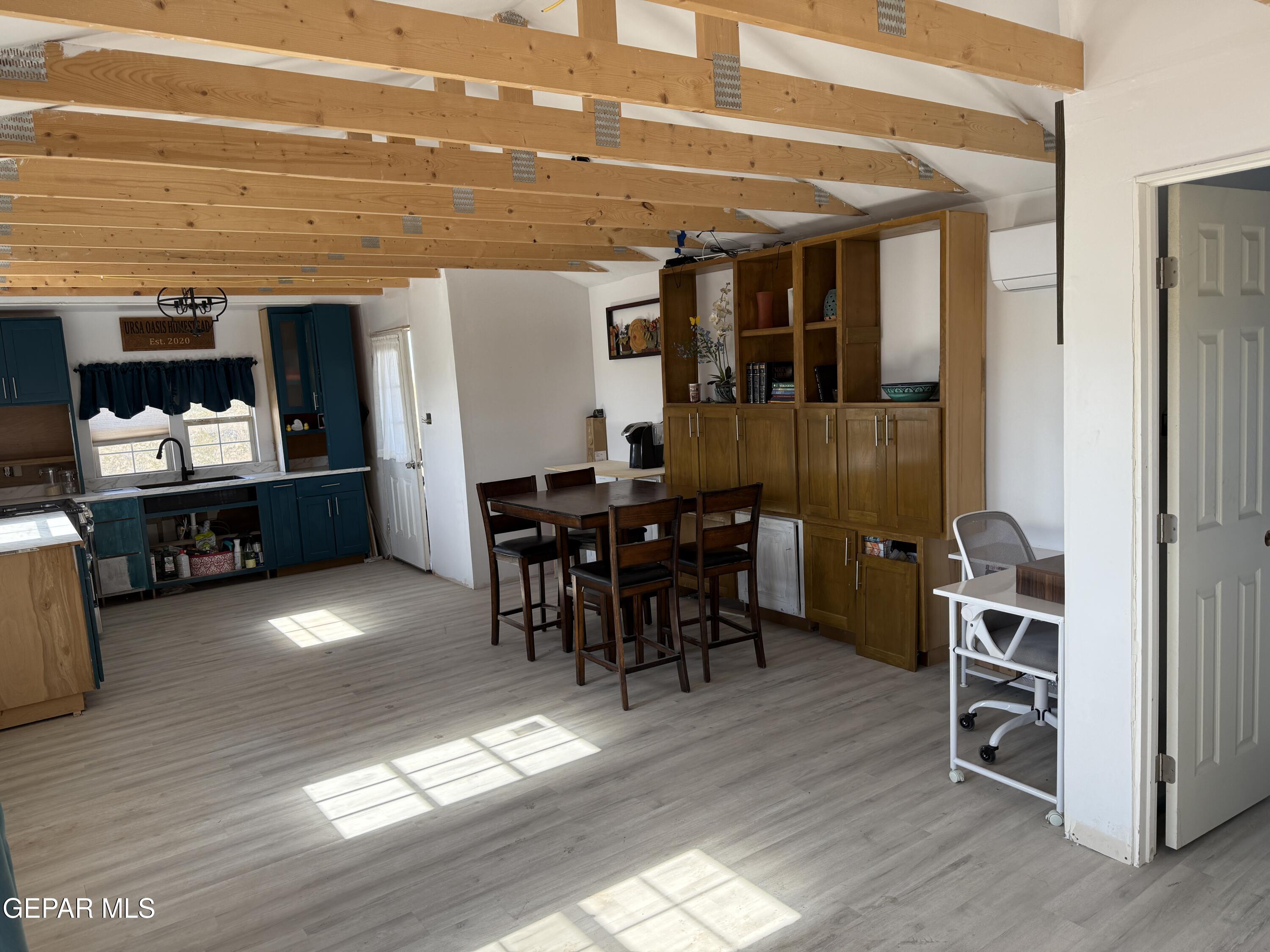 26 Ponderosa Road Salt Flat, TX 79847 - Photo 29 of 56 a view of a dining room with furniture and chandelier