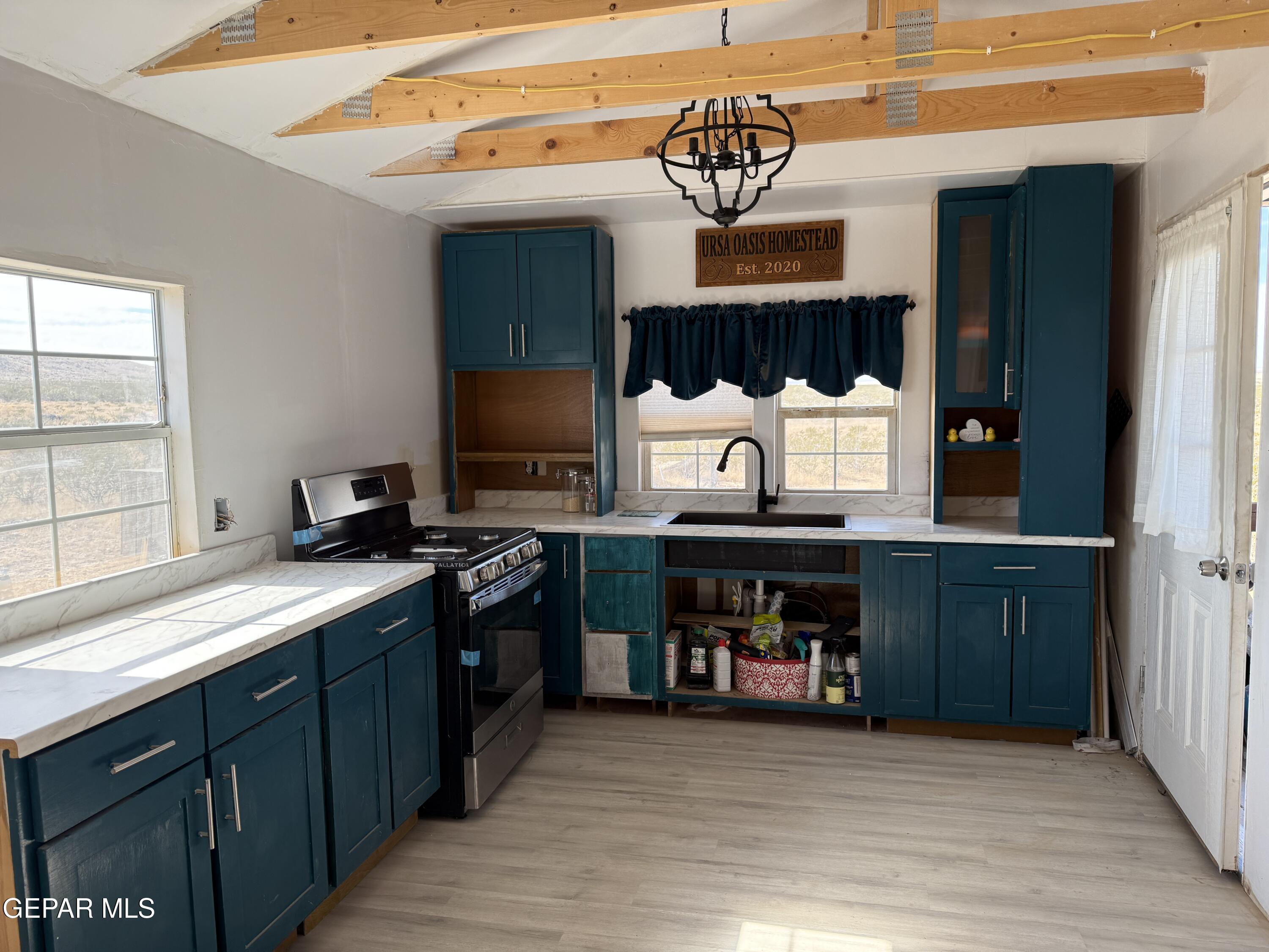 26 Ponderosa Road Salt Flat, TX 79847 - Photo 33 of 56 a kitchen with a sink cabinets and window