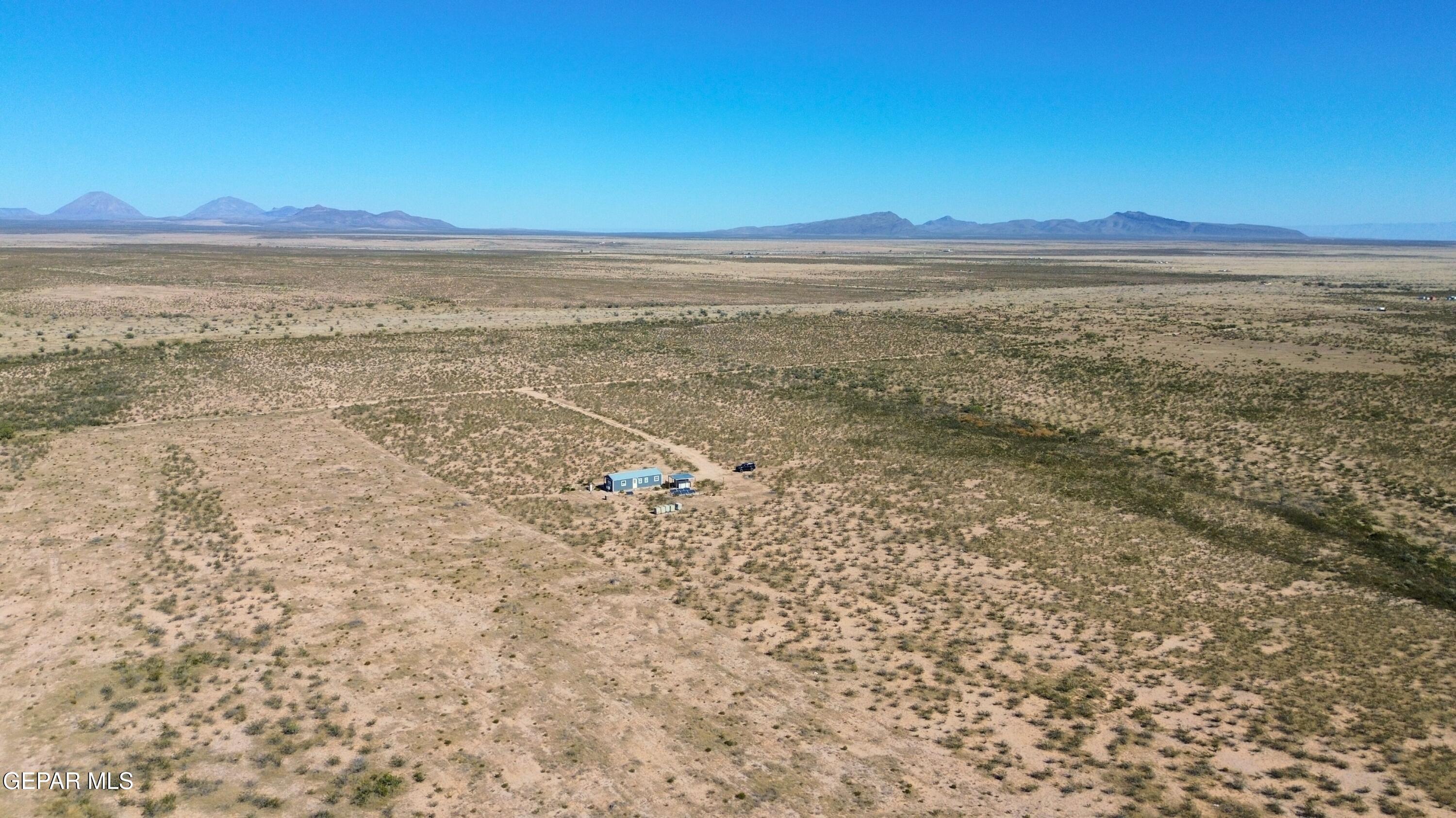 26 Ponderosa Road Salt Flat, TX 79847 - Photo 37 of 56 a view of an ocean beach and mountain