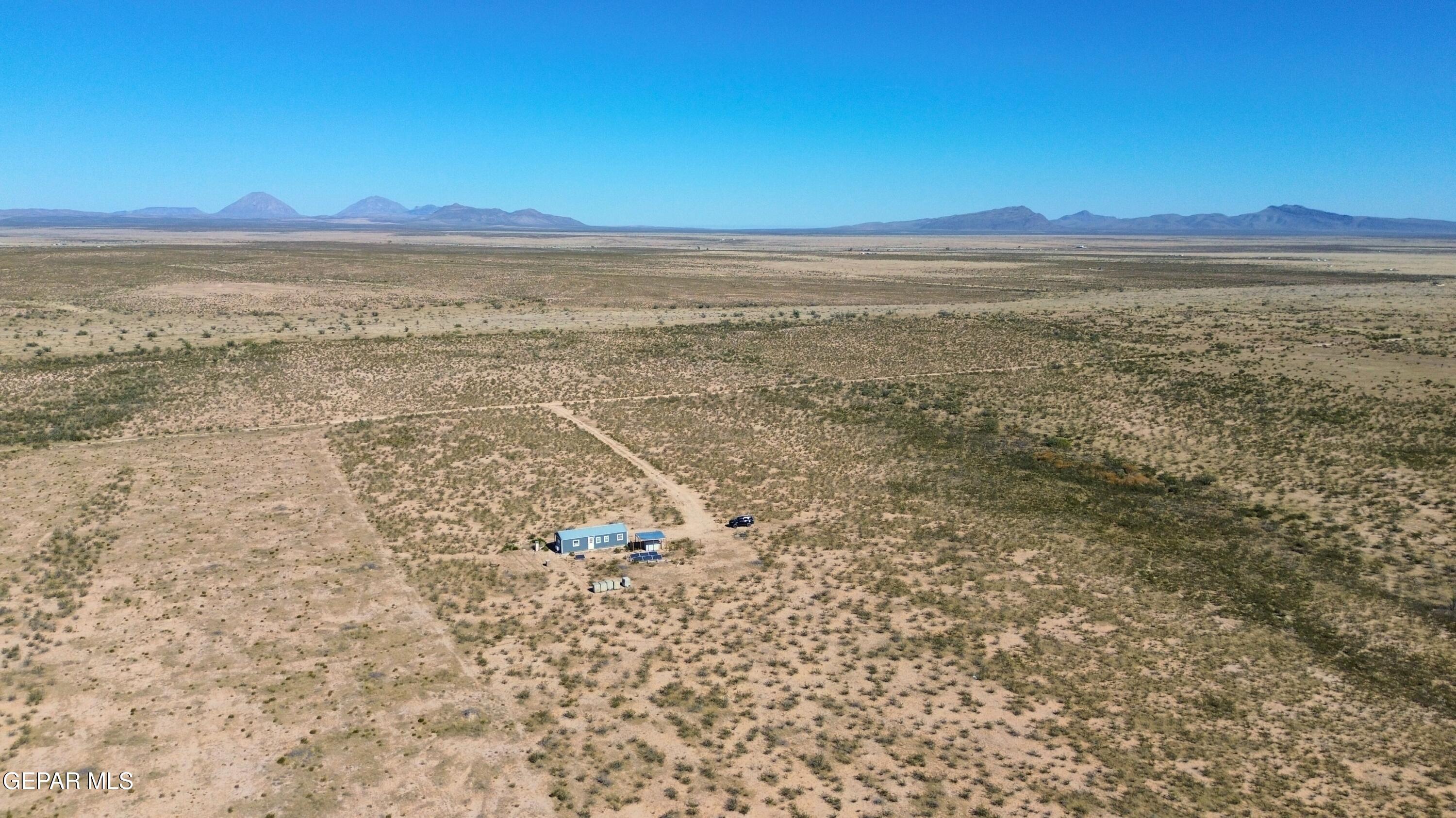 26 Ponderosa Road Salt Flat, TX 79847 - Photo 38 of 56 a view of an ocean beach and mountain