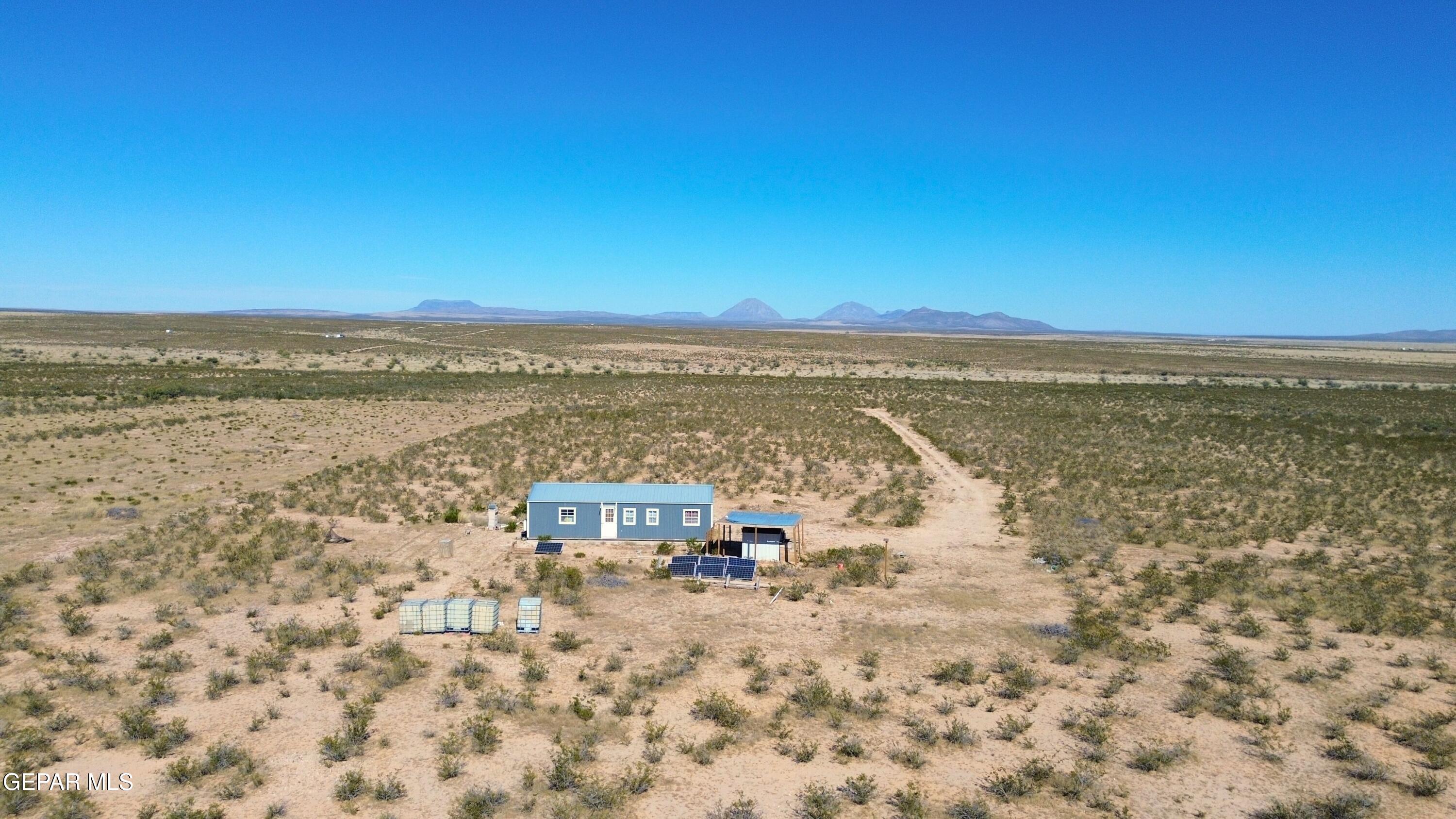 26 Ponderosa Road Salt Flat, TX 79847 - Photo 9 of 56 a view of a city with an ocean view