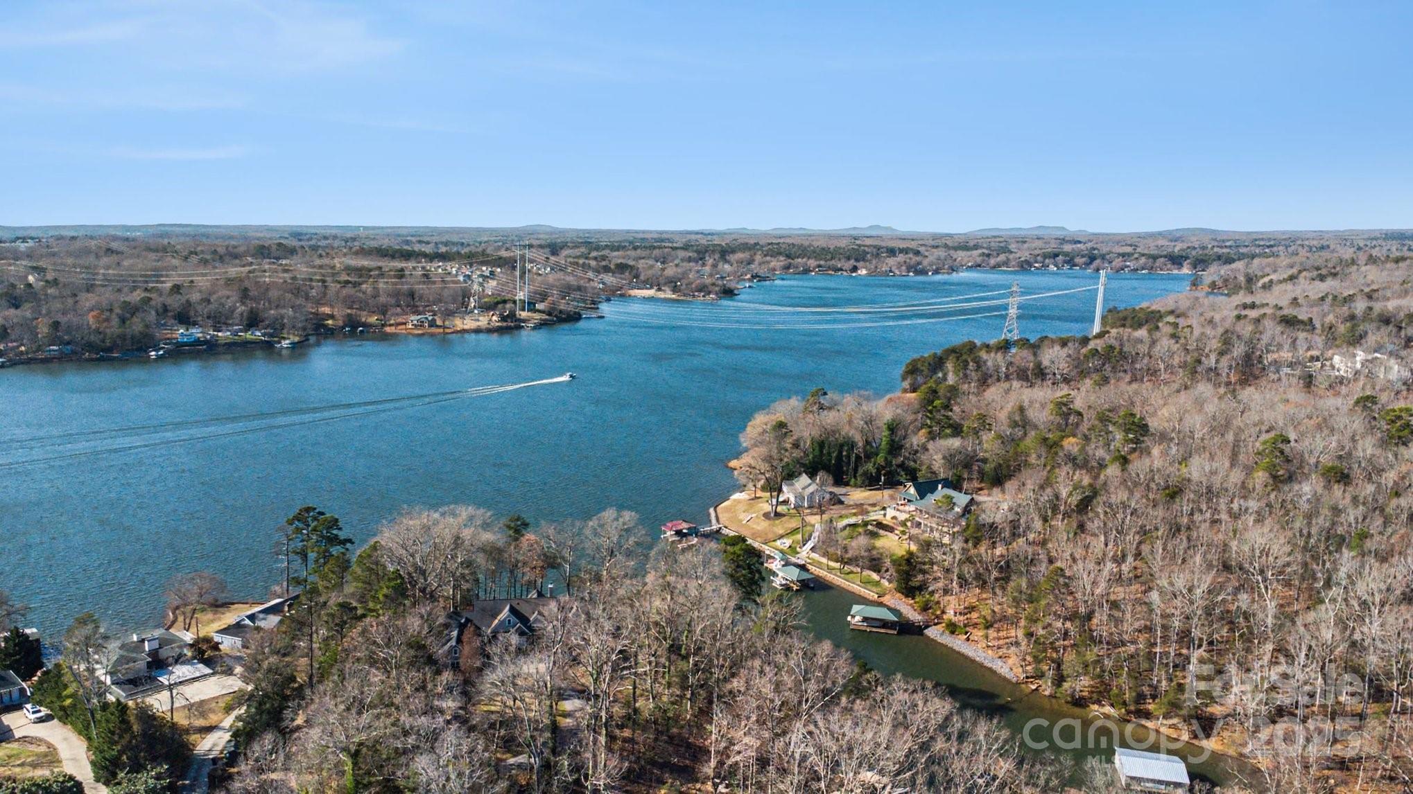 9026 Island Point Road Charlotte, NC 28278 - Photo 14 of 19 a view of a lake with a city