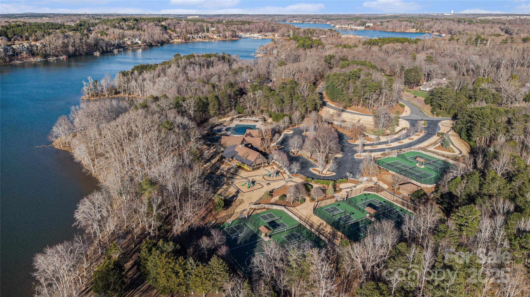 9026 Island Point Road Charlotte, NC 28278 - Photo 17 of 19 a view of a lake with mountains in the background