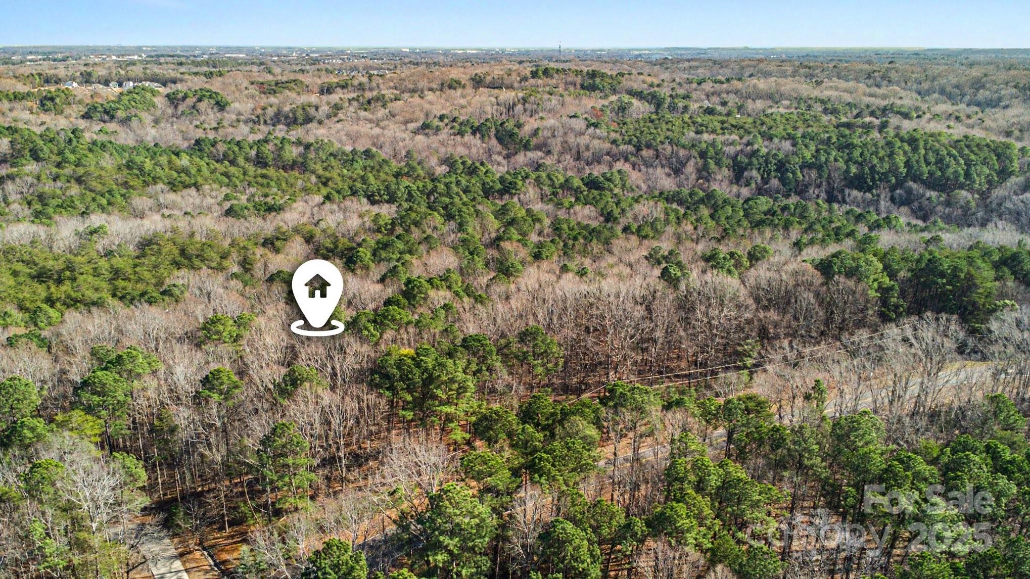 9026 Island Point Road Charlotte, NC 28278 - Photo 2 of 19 an aerial view of a house with a yard