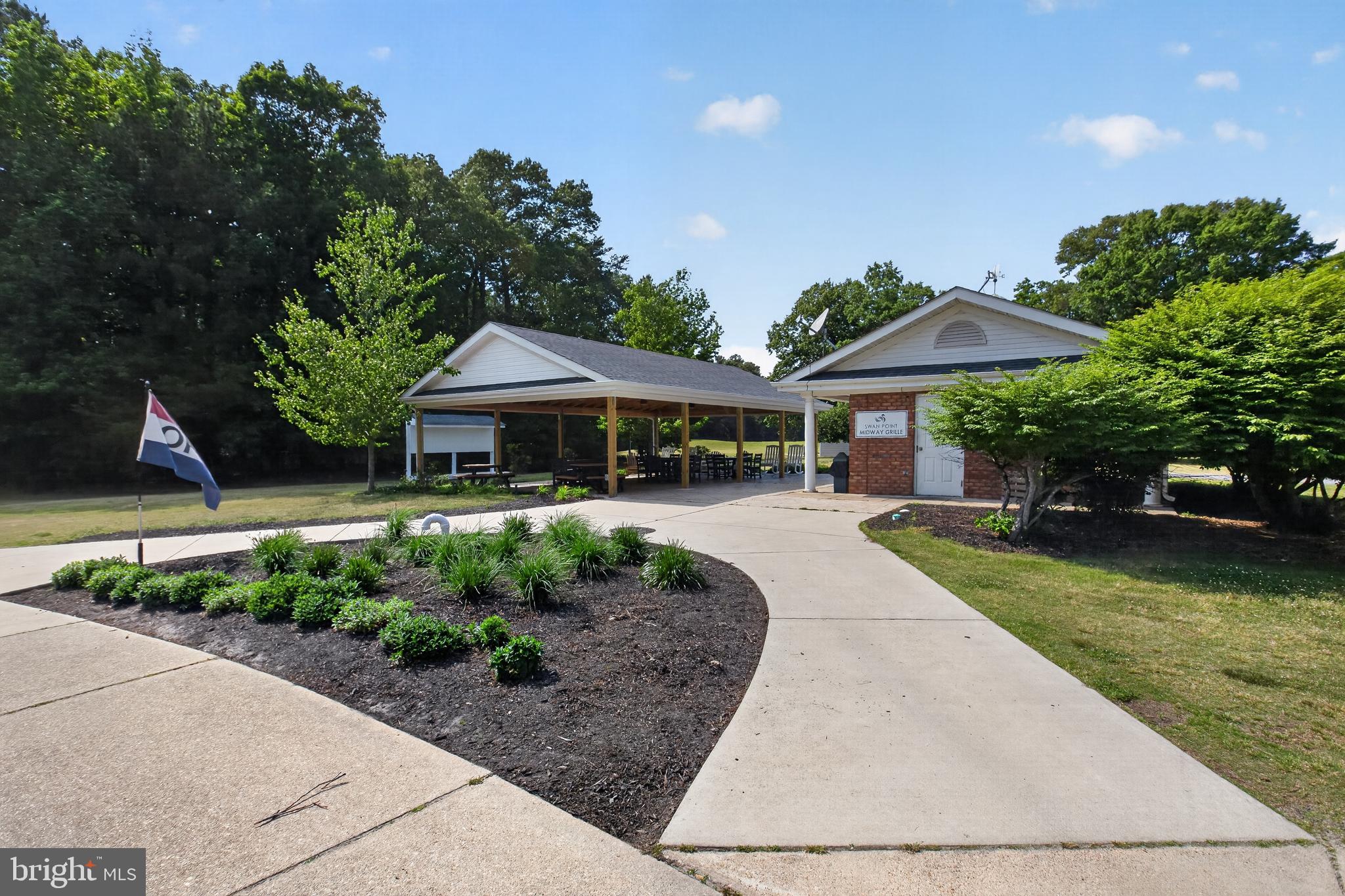 14575 Honeysuckle Way Issue, MD 20645 - Photo 43 of 49 a front view of a house with garden