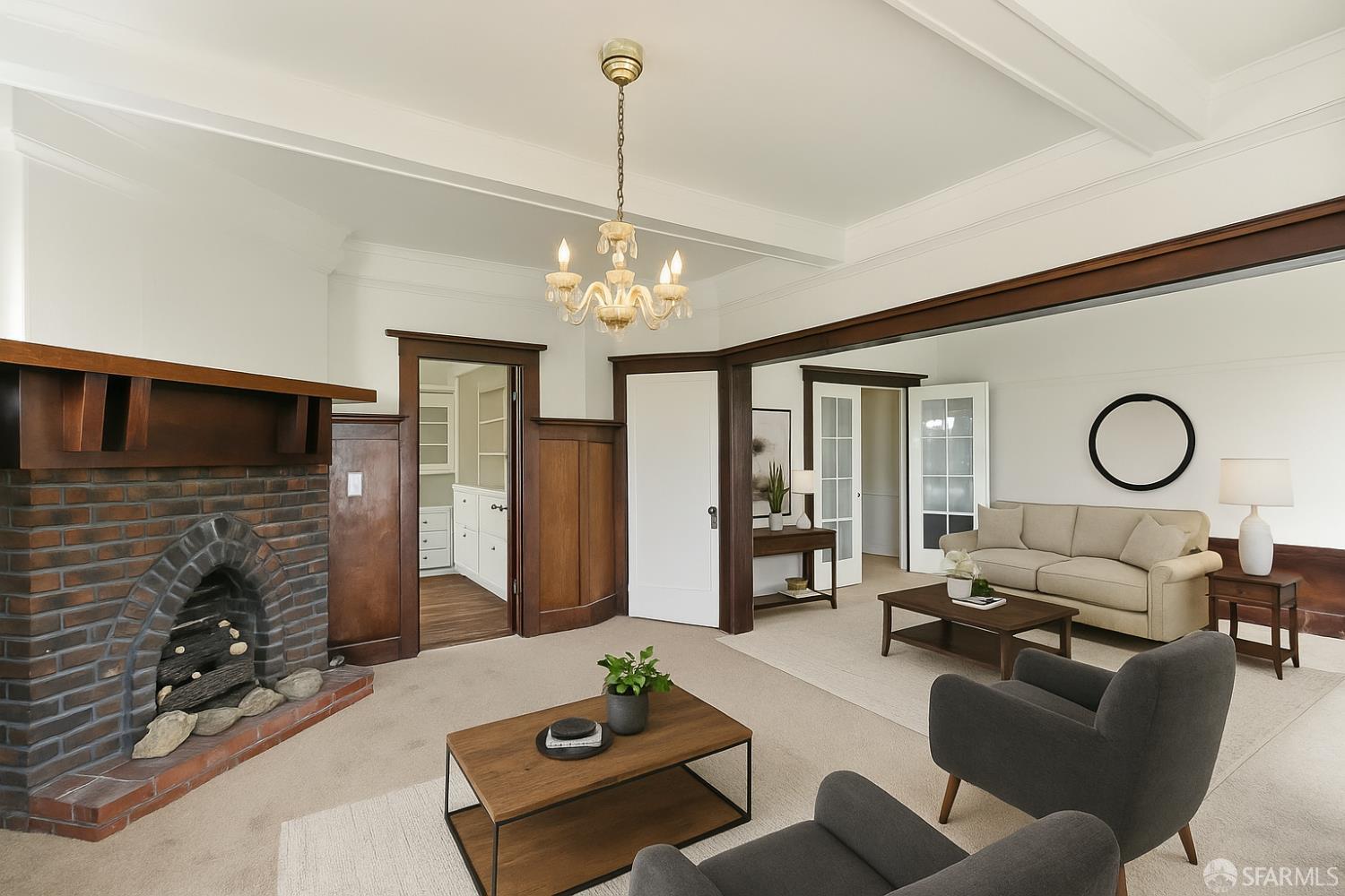 425-429 Steiner Street San Francisco, CA 94117 - Photo 12 of 40 a living room with fireplace furniture and a chandelier