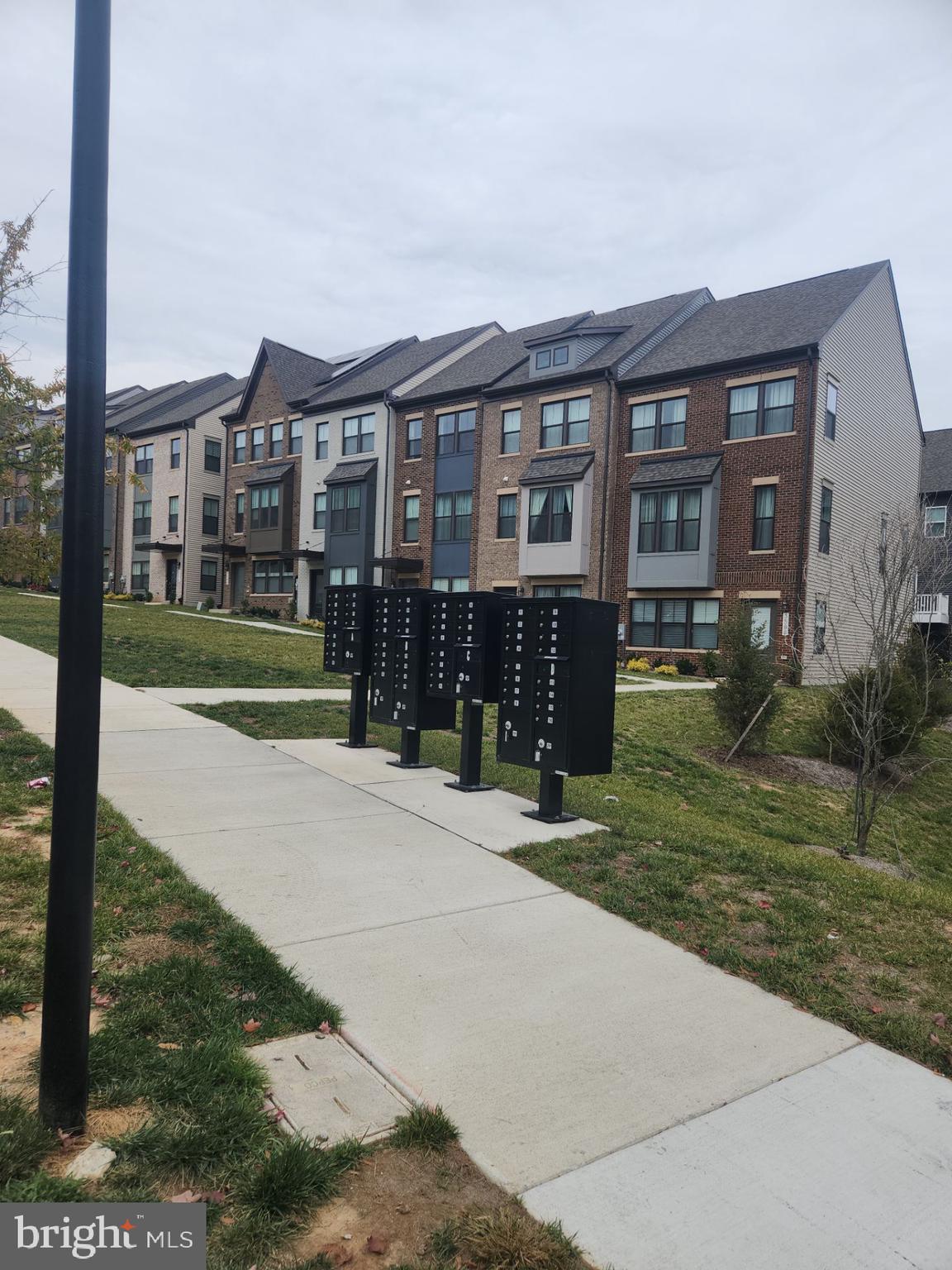 6730 Belcrest Road Hyattsville, MD 20782 - Photo 30 of 30 a front view of a house with a yard