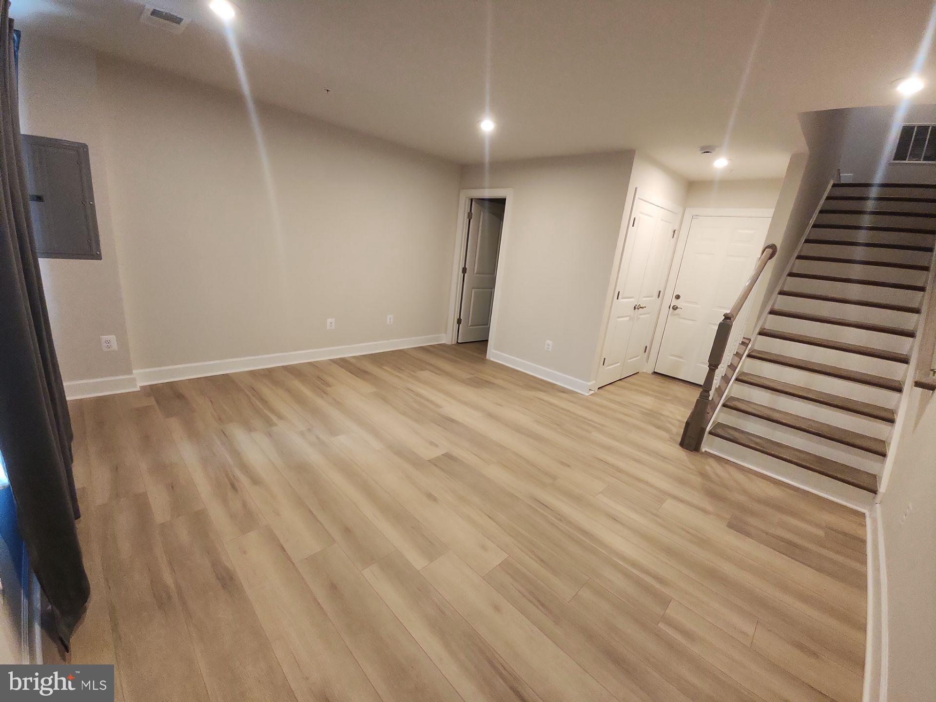 6730 Belcrest Road Hyattsville, MD 20782 - Photo 3 of 30 a view of an entryway with wooden floor