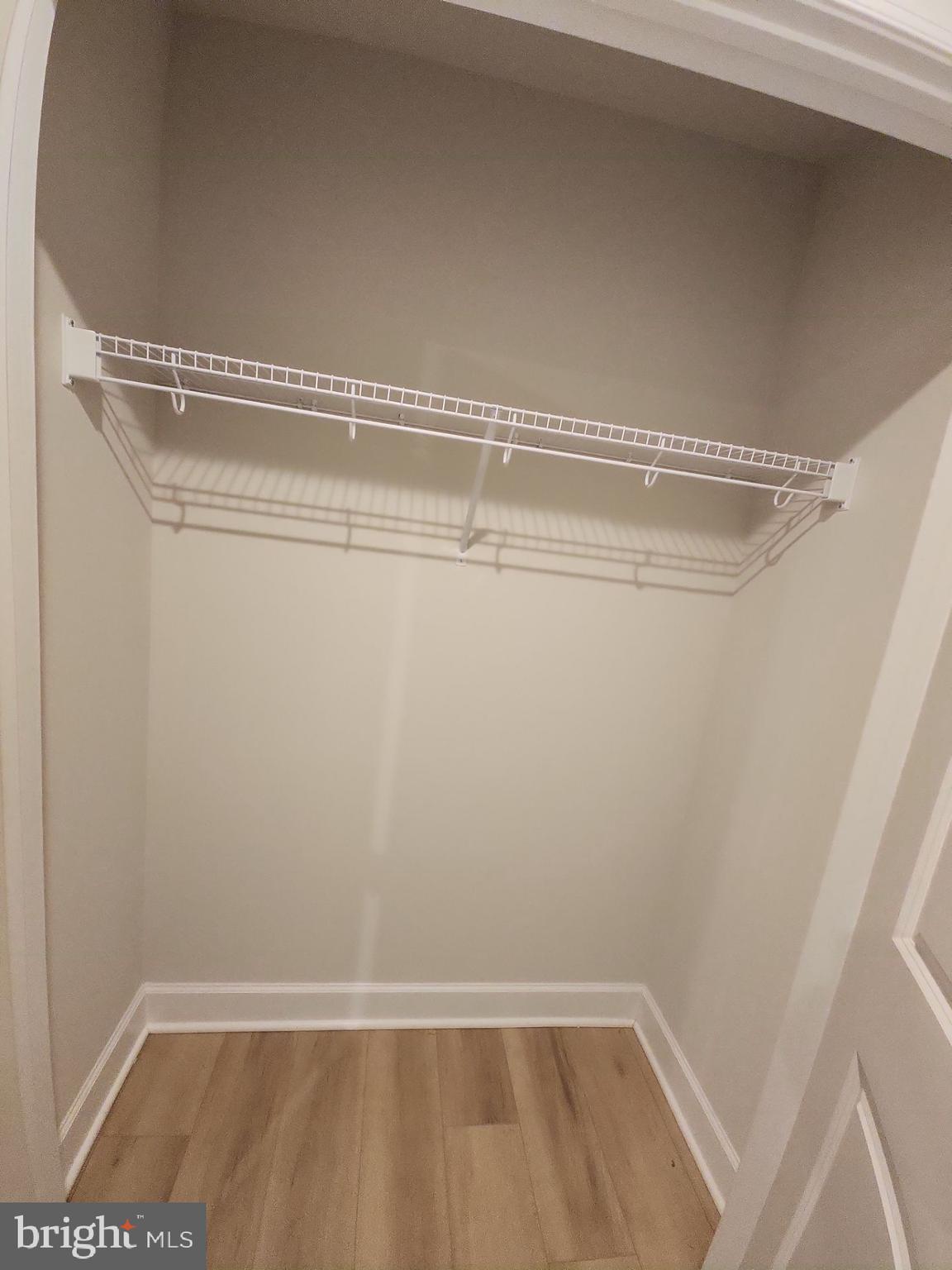 6730 Belcrest Road Hyattsville, MD 20782 - Photo 8 of 30 a view of a room with racks on the wall