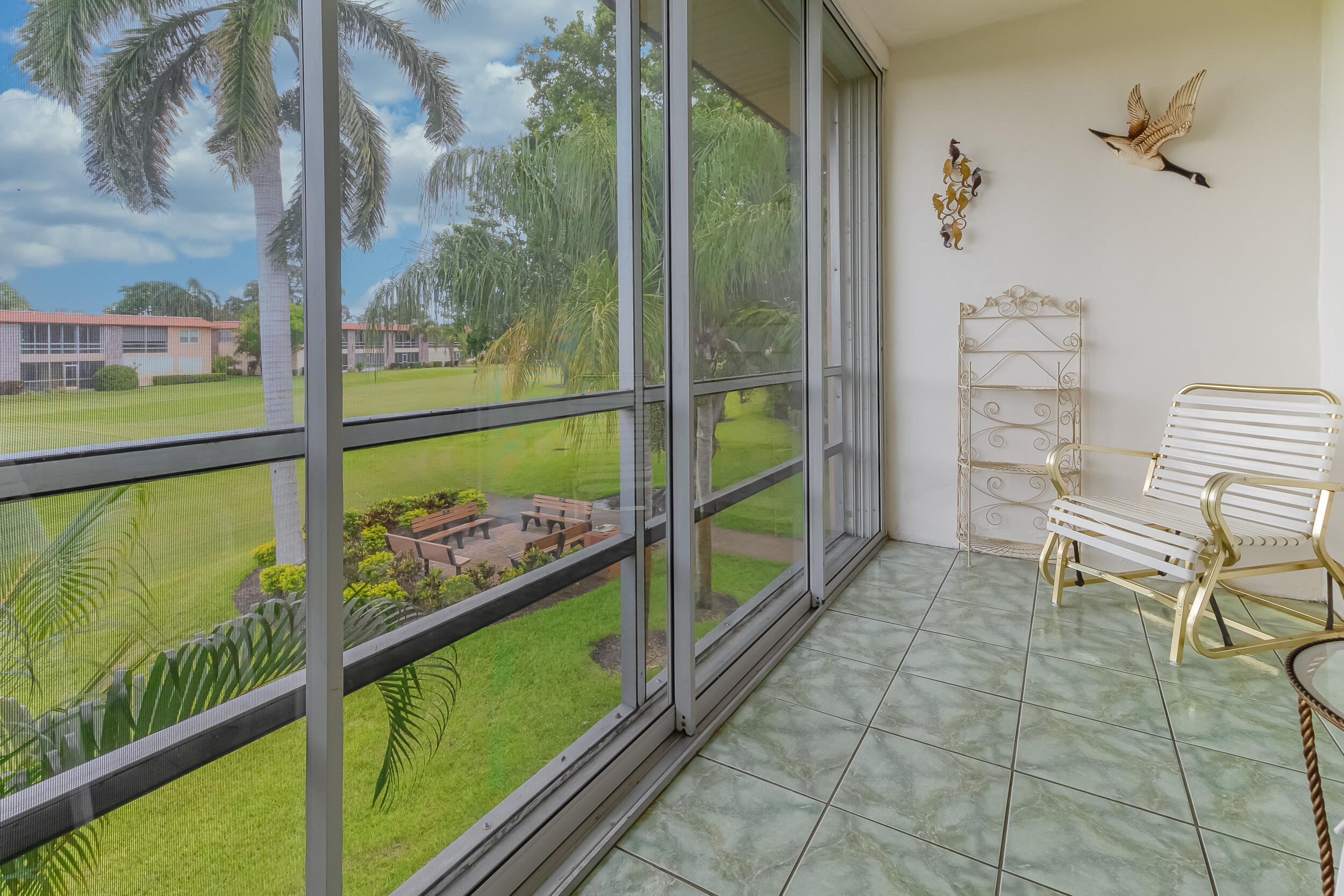 1941 Southwest Palm City Road, Unit 21J Stuart, FL 34994 - Photo 17 of 23 Screened Balcony
