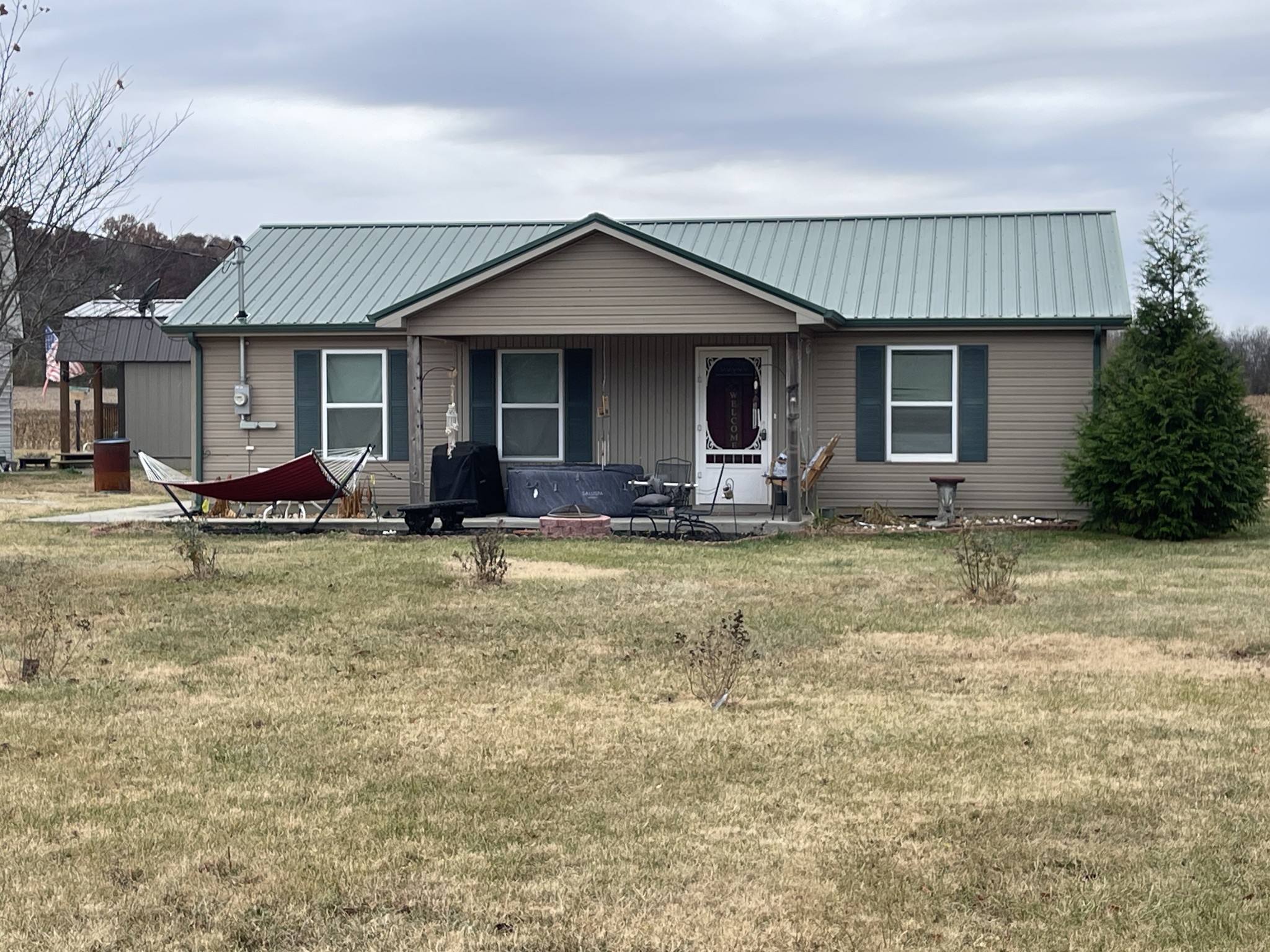 378 Sanders Road Decherd, TN 37324 - Photo 1 of 27 a front view of house with yard