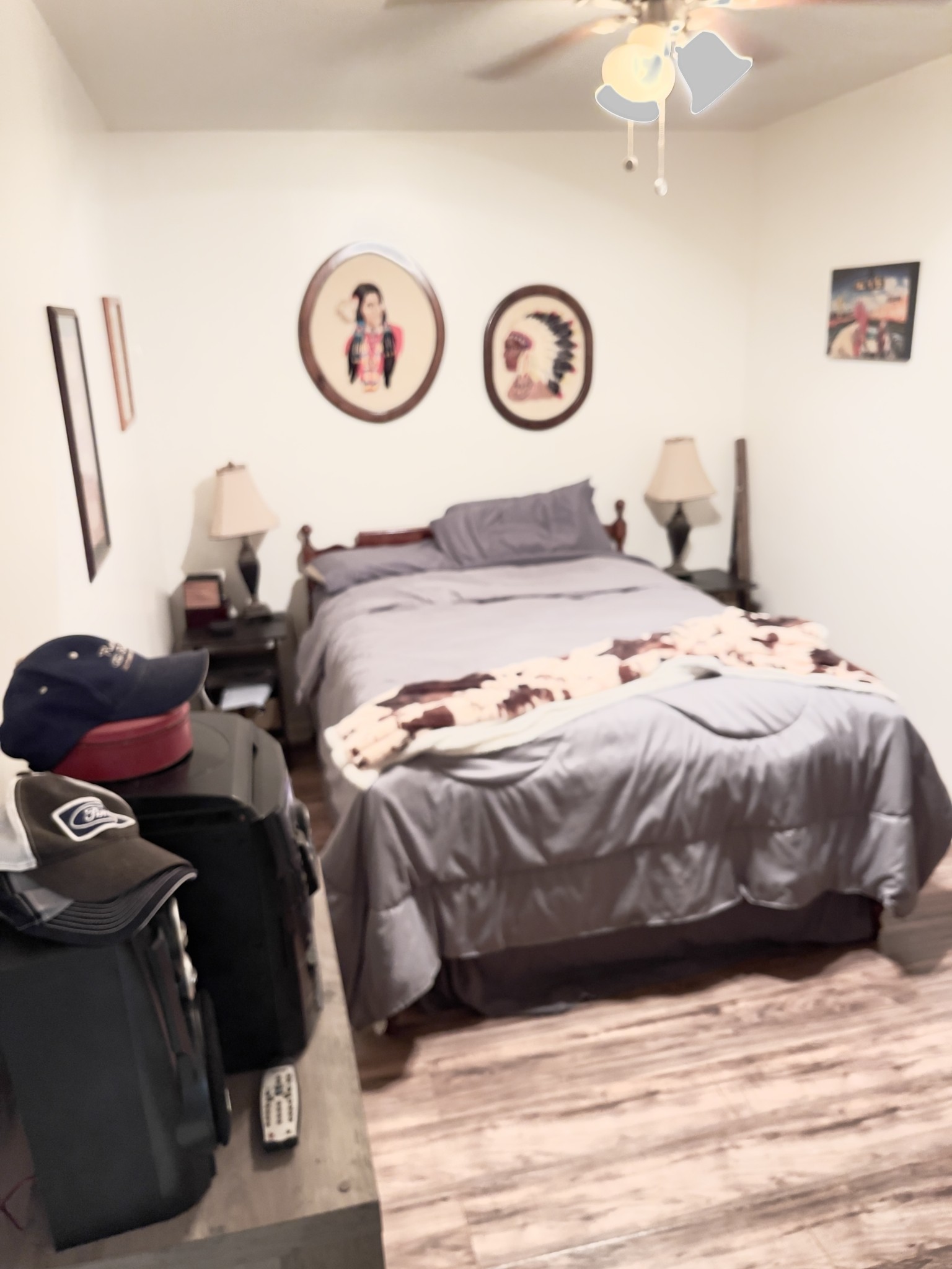378 Sanders Road Decherd, TN 37324 - Photo 11 of 27 a bedroom with a bed and a table with a bookshelf
