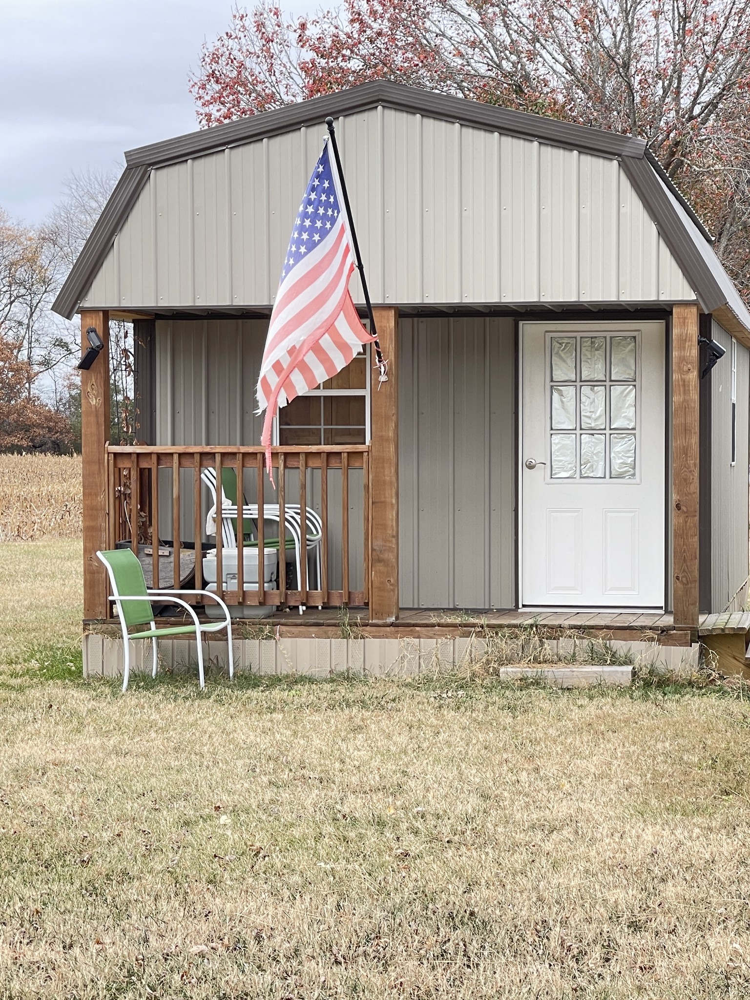 378 Sanders Road Decherd, TN 37324 - Photo 16 of 27 a backyard of a house with table and chairs