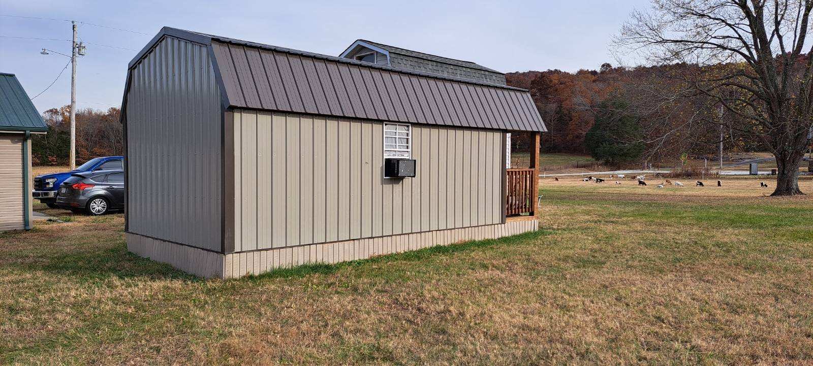 378 Sanders Road Decherd, TN 37324 - Photo 17 of 27 a view of a house with a yard